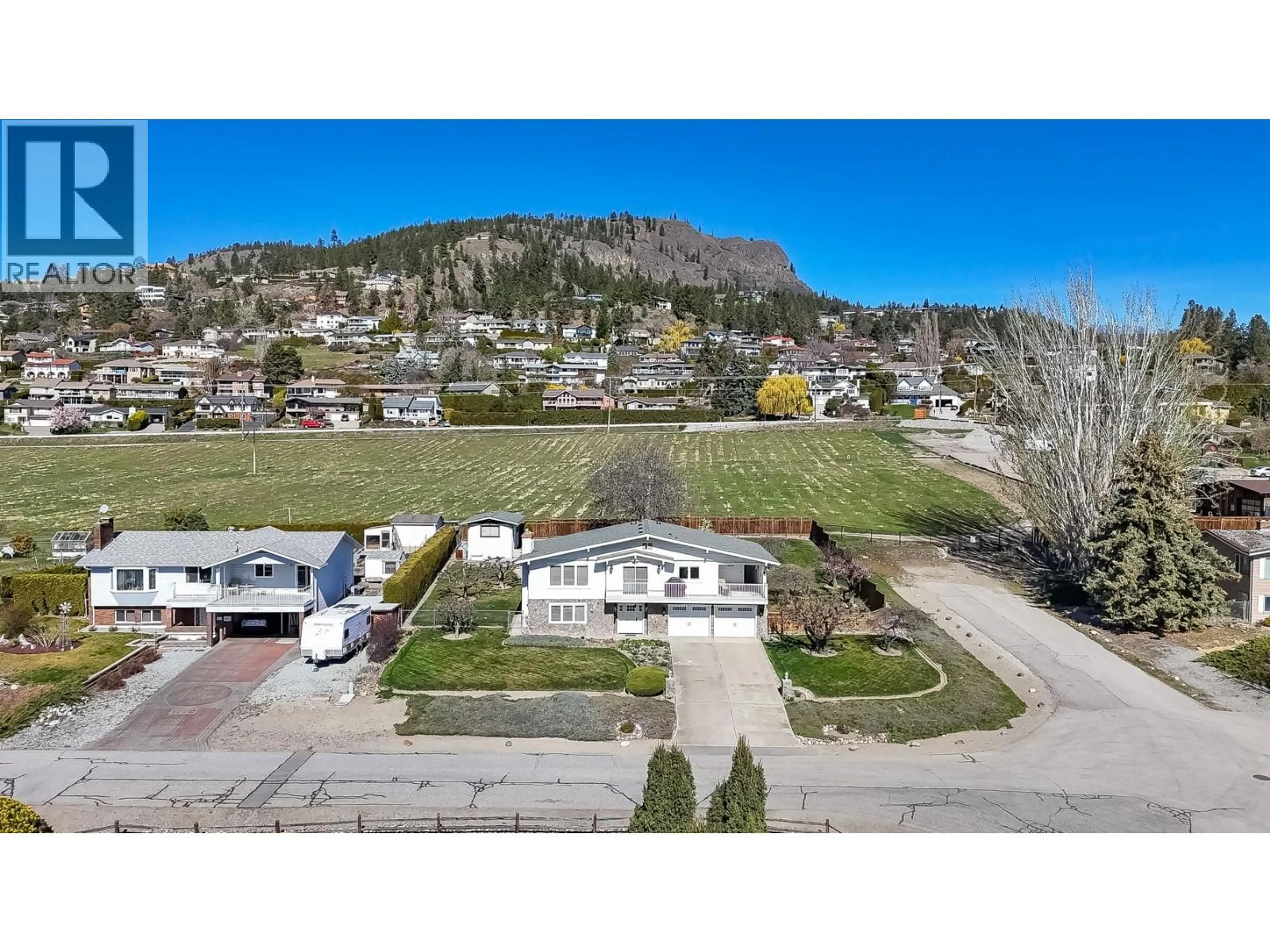 A pic from outside/outdoor area/front of a property/back of a property/a pic from drone, mountain view for 1056 AUBREY ROAD, West Kelowna British Columbia V1Z2V9