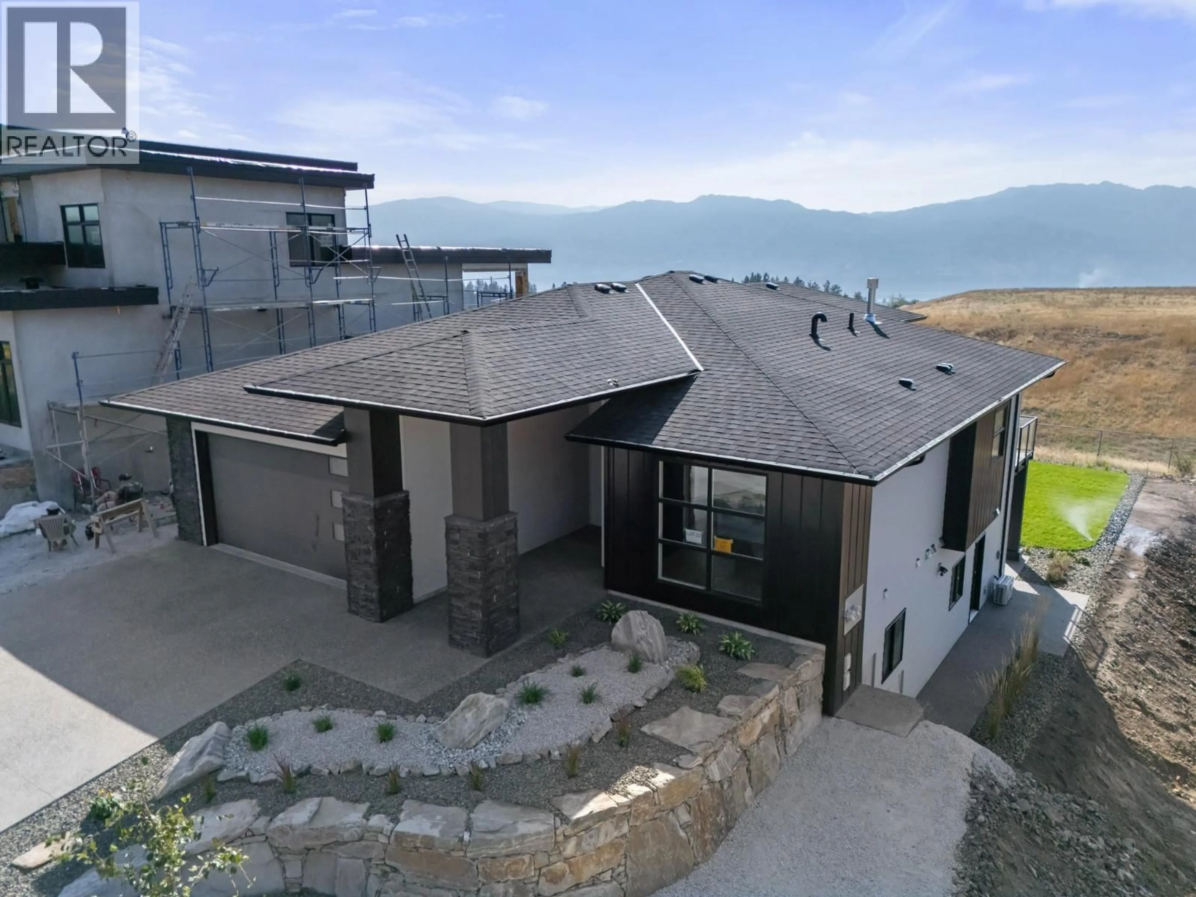 A pic from outside/outdoor area/front of a property/back of a property/a pic from drone, unknown for 2531 PINNACLE RIDGE DRIVE, West Kelowna British Columbia V4T0G4