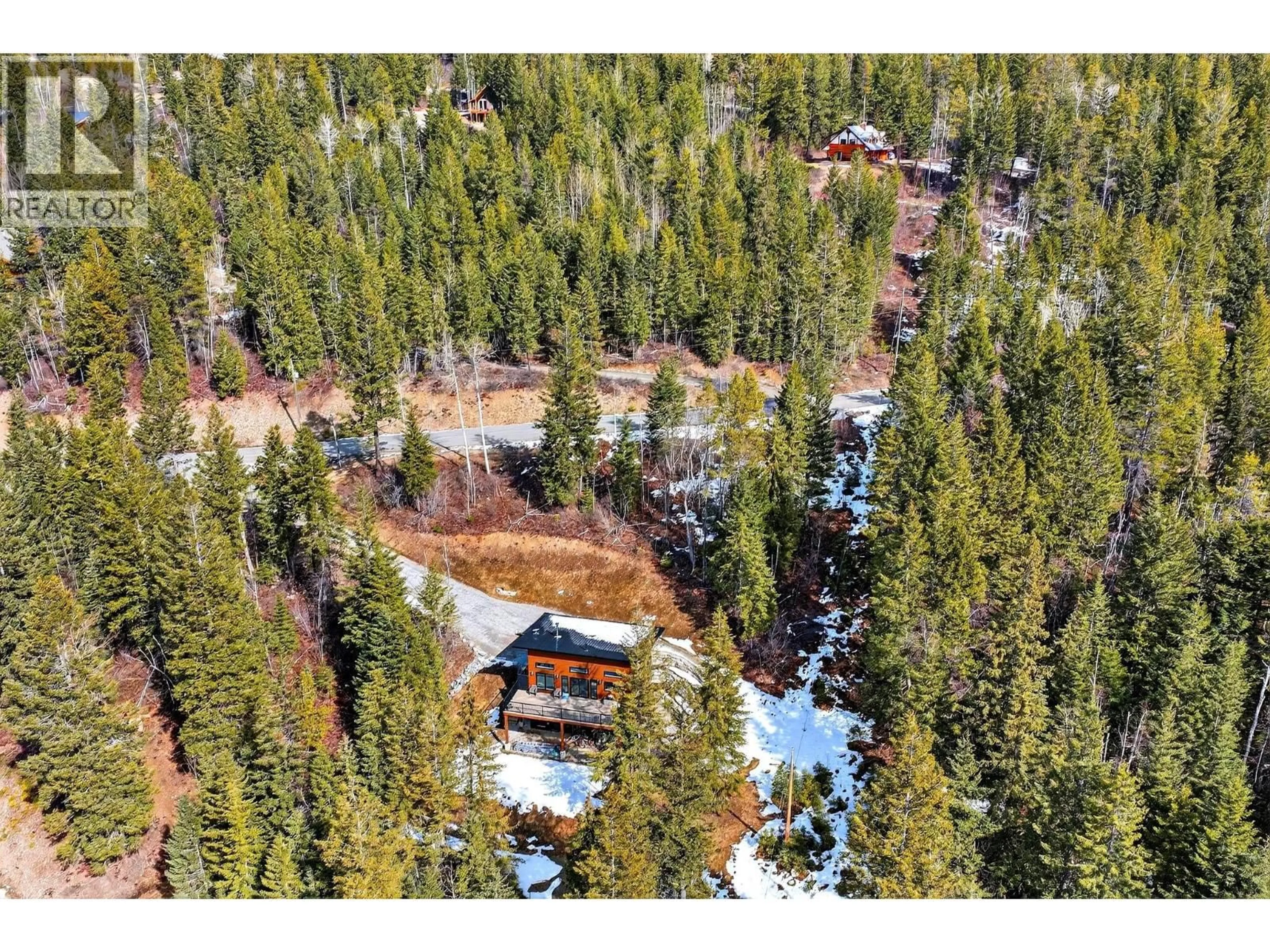 A pic from outside/outdoor area/front of a property/back of a property/a pic from drone, forest/trees view for 1414 BLACK BEAR DRIVE, Golden British Columbia V0A1H7