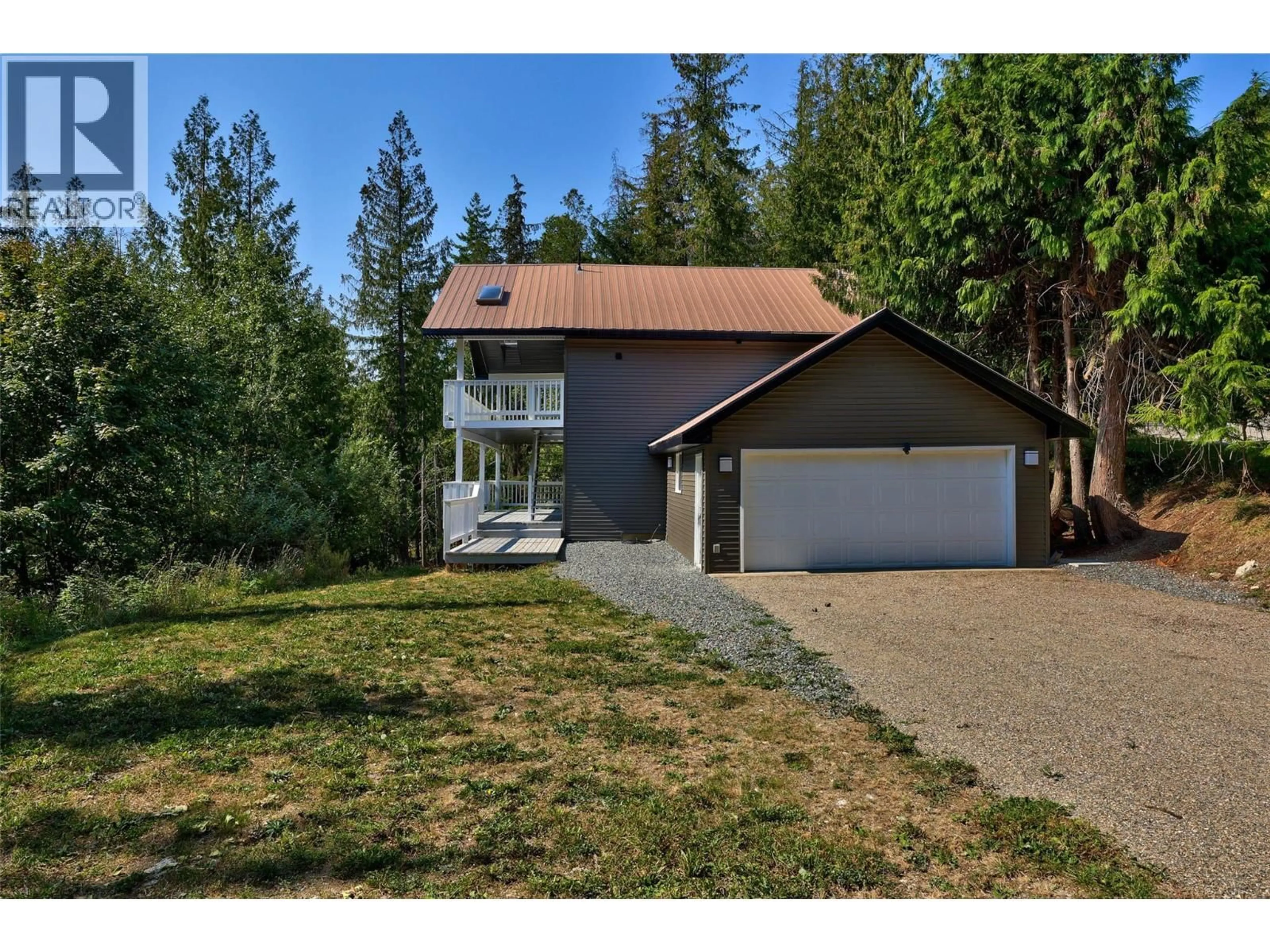 A pic from outside/outdoor area/front of a property/back of a property/a pic from drone, street for 2725 VICKERS TRAIL, Anglemont British Columbia V0E1M8