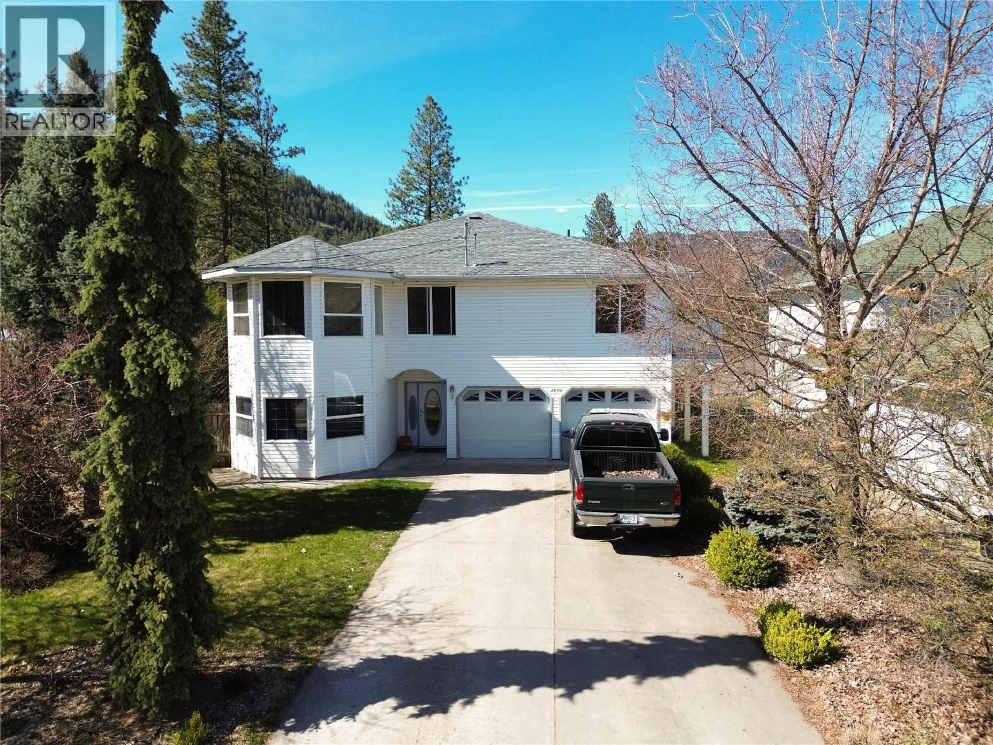 A pic from outside/outdoor area/front of a property/back of a property/a pic from drone, street for 2859 75TH AVENUE, Grand Forks British Columbia V0H1H2