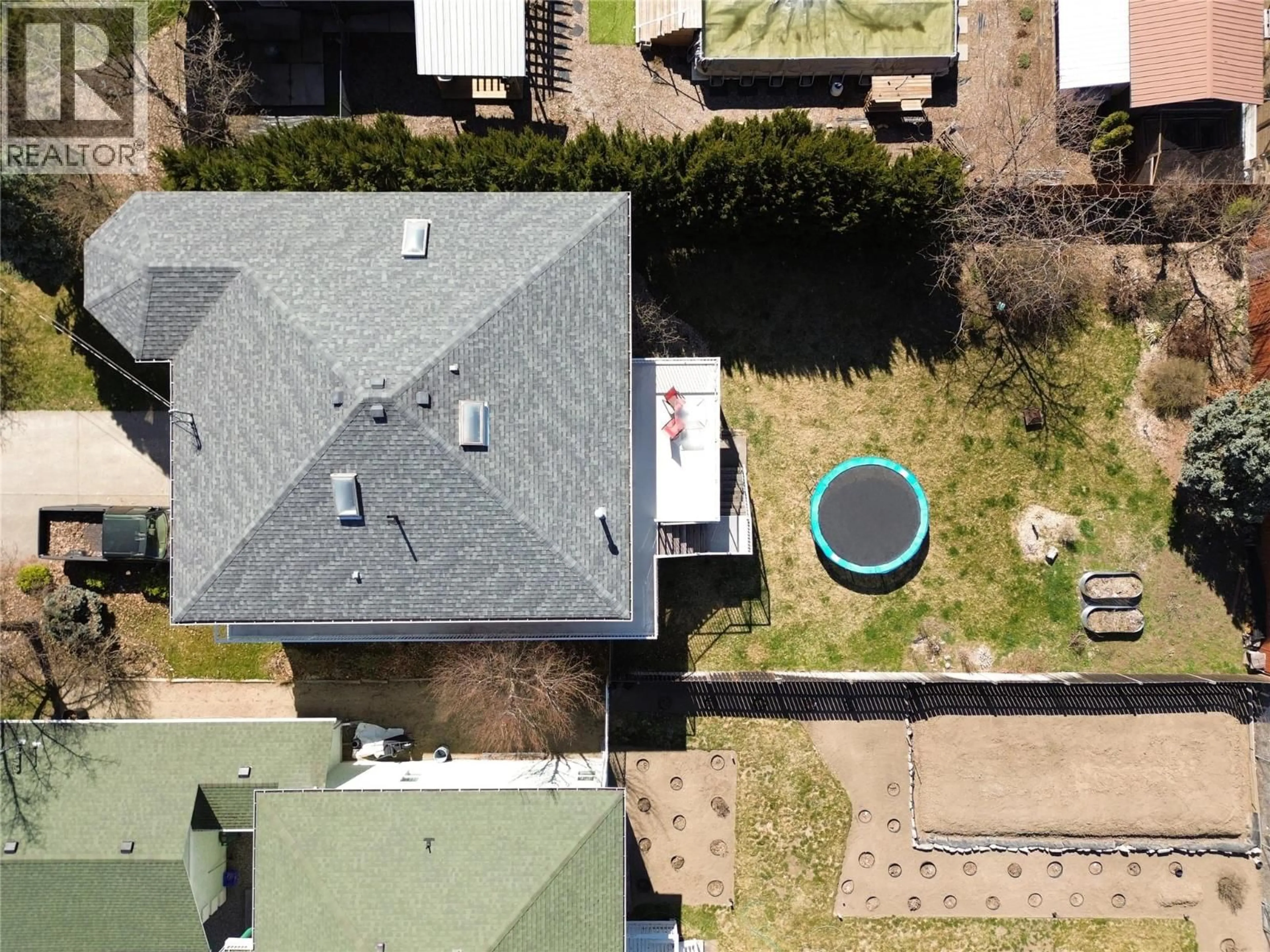 A pic from outside/outdoor area/front of a property/back of a property/a pic from drone, street for 2859 75TH AVENUE, Grand Forks British Columbia V0H1H2