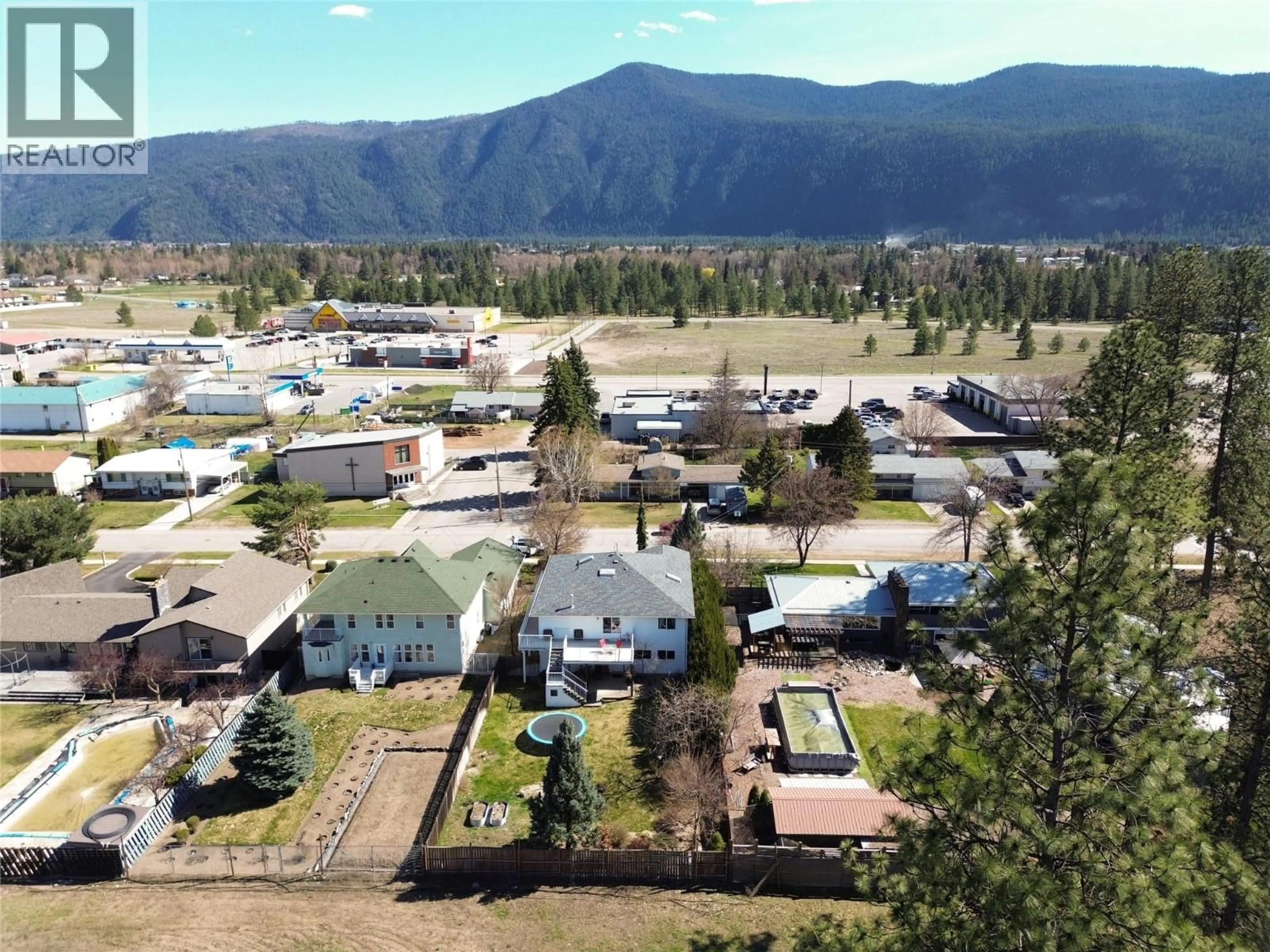 A pic from outside/outdoor area/front of a property/back of a property/a pic from drone, mountain view for 2859 75TH AVENUE, Grand Forks British Columbia V0H1H2
