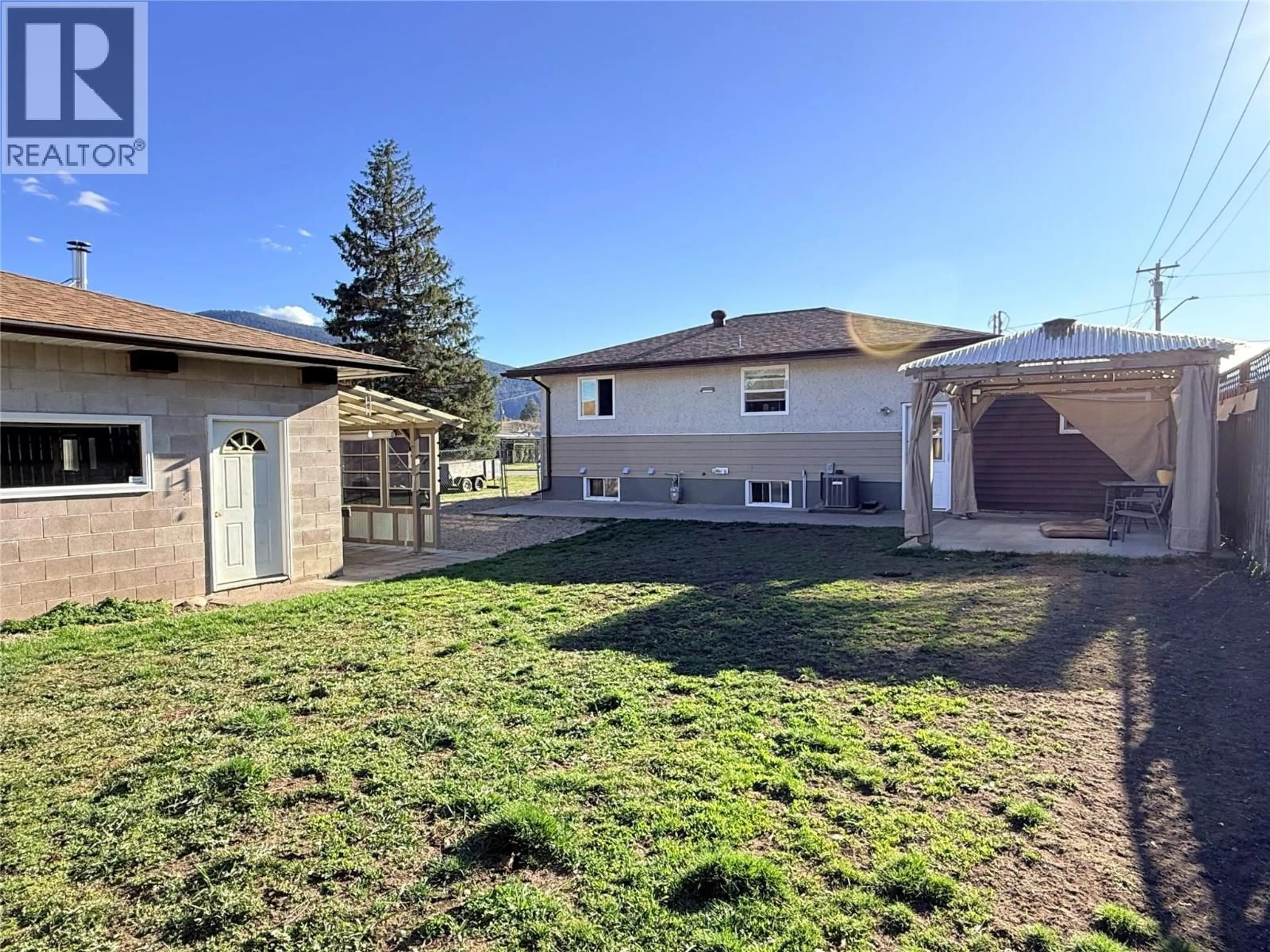 A pic from outside/outdoor area/front of a property/back of a property/a pic from drone, street for 6980 17TH STREET, Grand Forks British Columbia V0H1H0