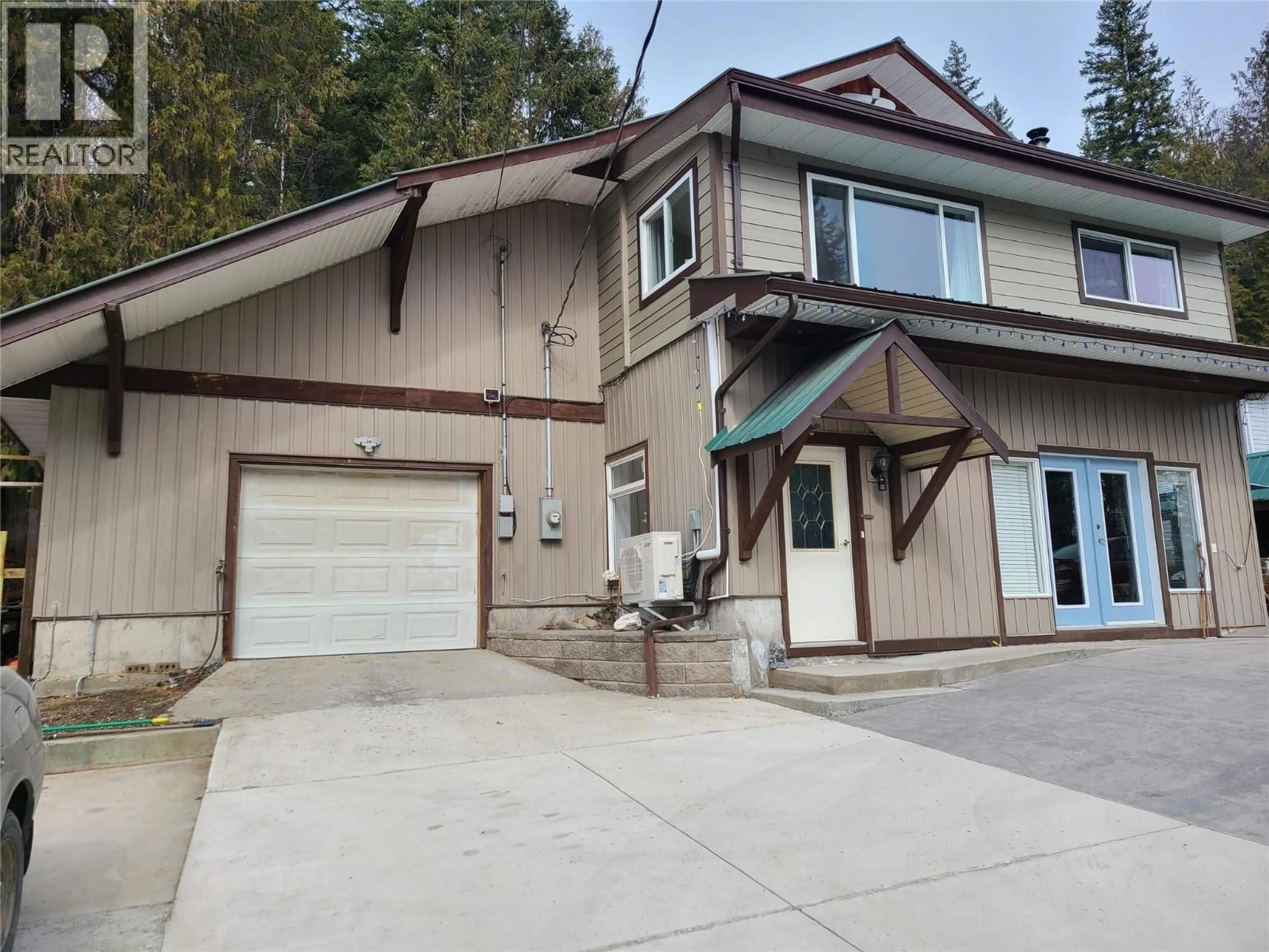 Home with vinyl exterior material, street for 6327 SQUILAX-ANGLEMONT ROAD, Magna Bay British Columbia V0E1M7