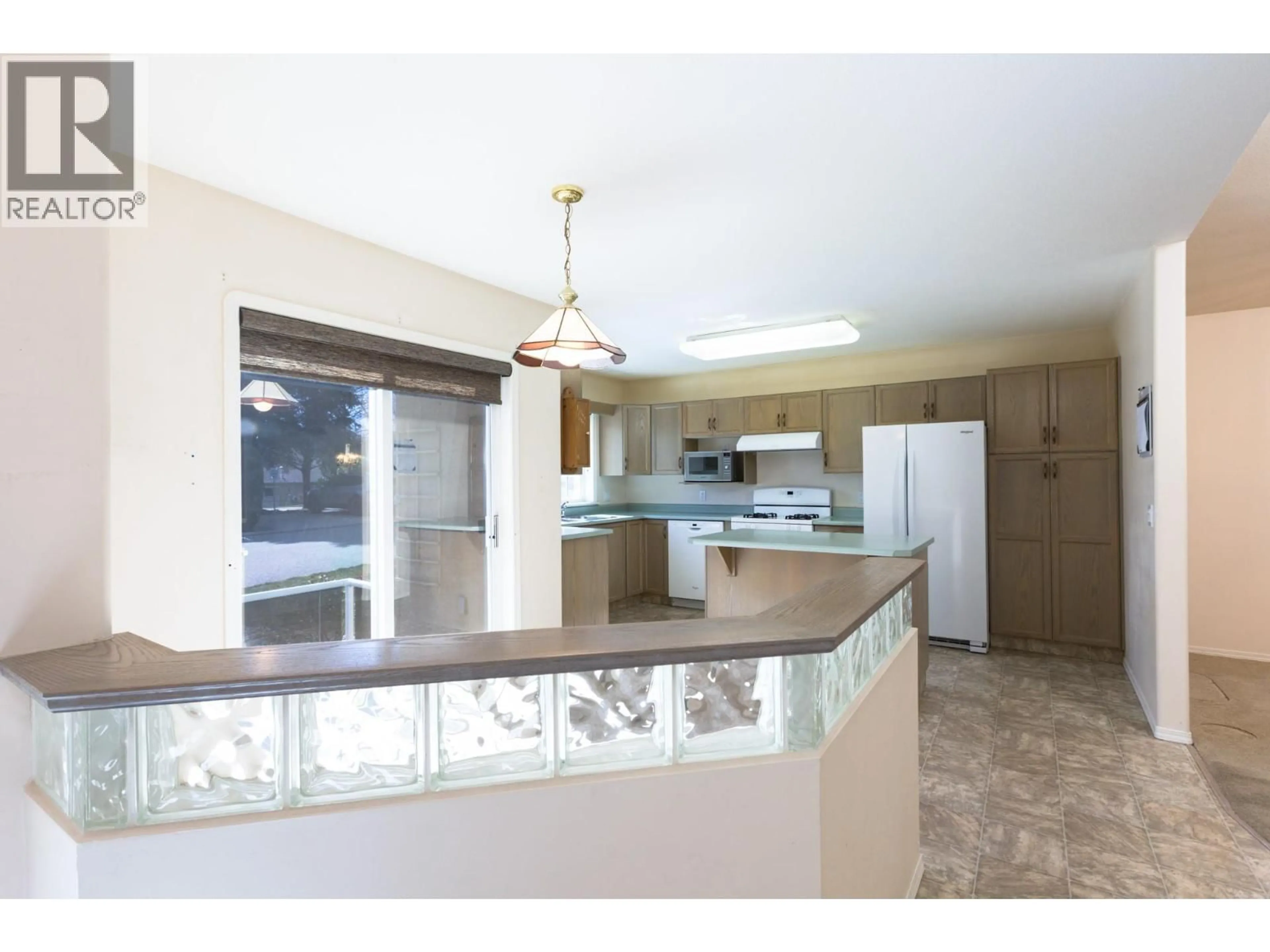 Open concept kitchen, ceramic/tile floor for 20 - 2210 LOUIE DRIVE, West Kelowna British Columbia V4T2L7