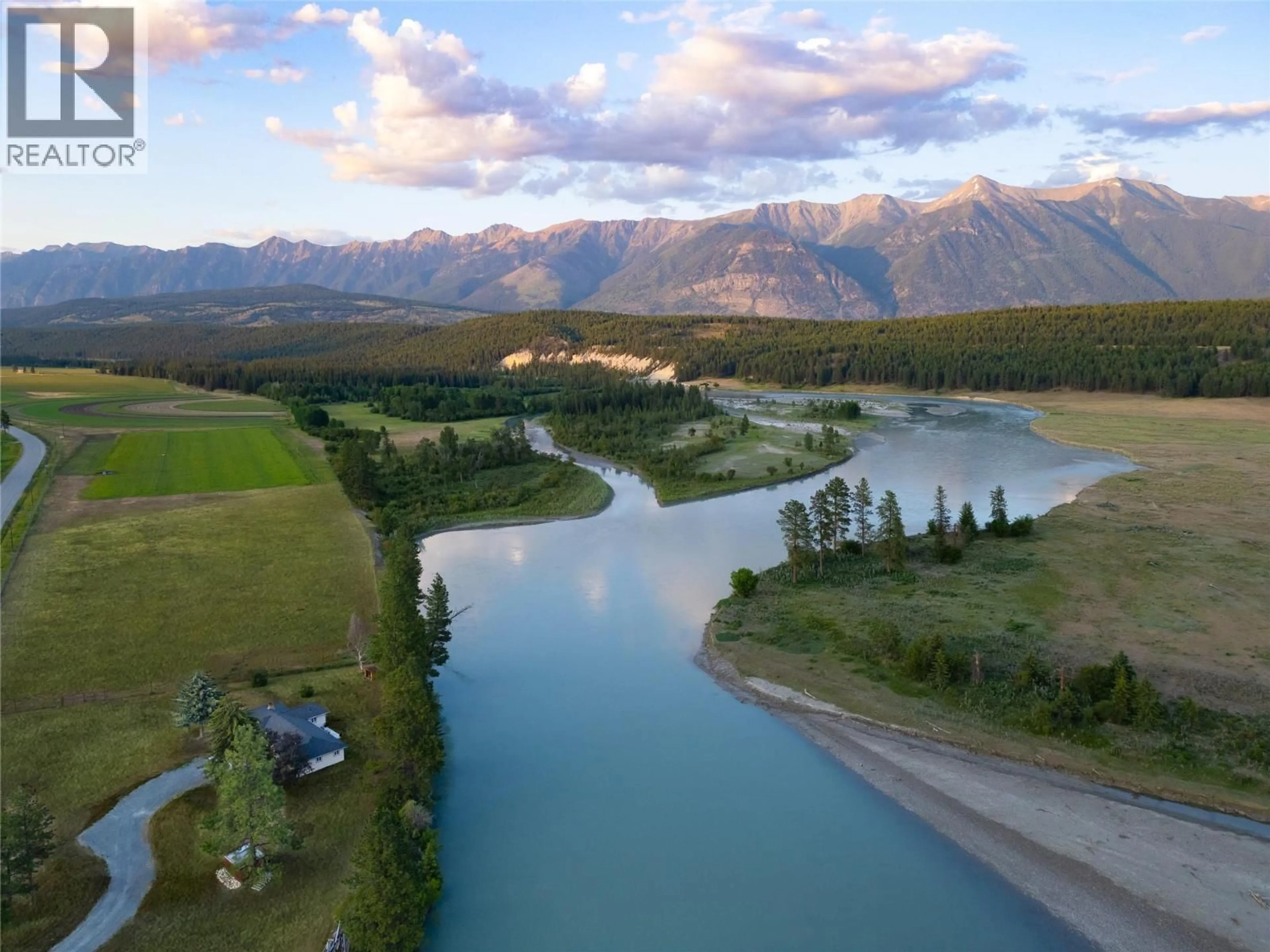 A pic from outside/outdoor area/front of a property/back of a property/a pic from drone, water/lake/river/ocean view for 5496 93/95 HIGHWAY, Wasa British Columbia V0B0A7