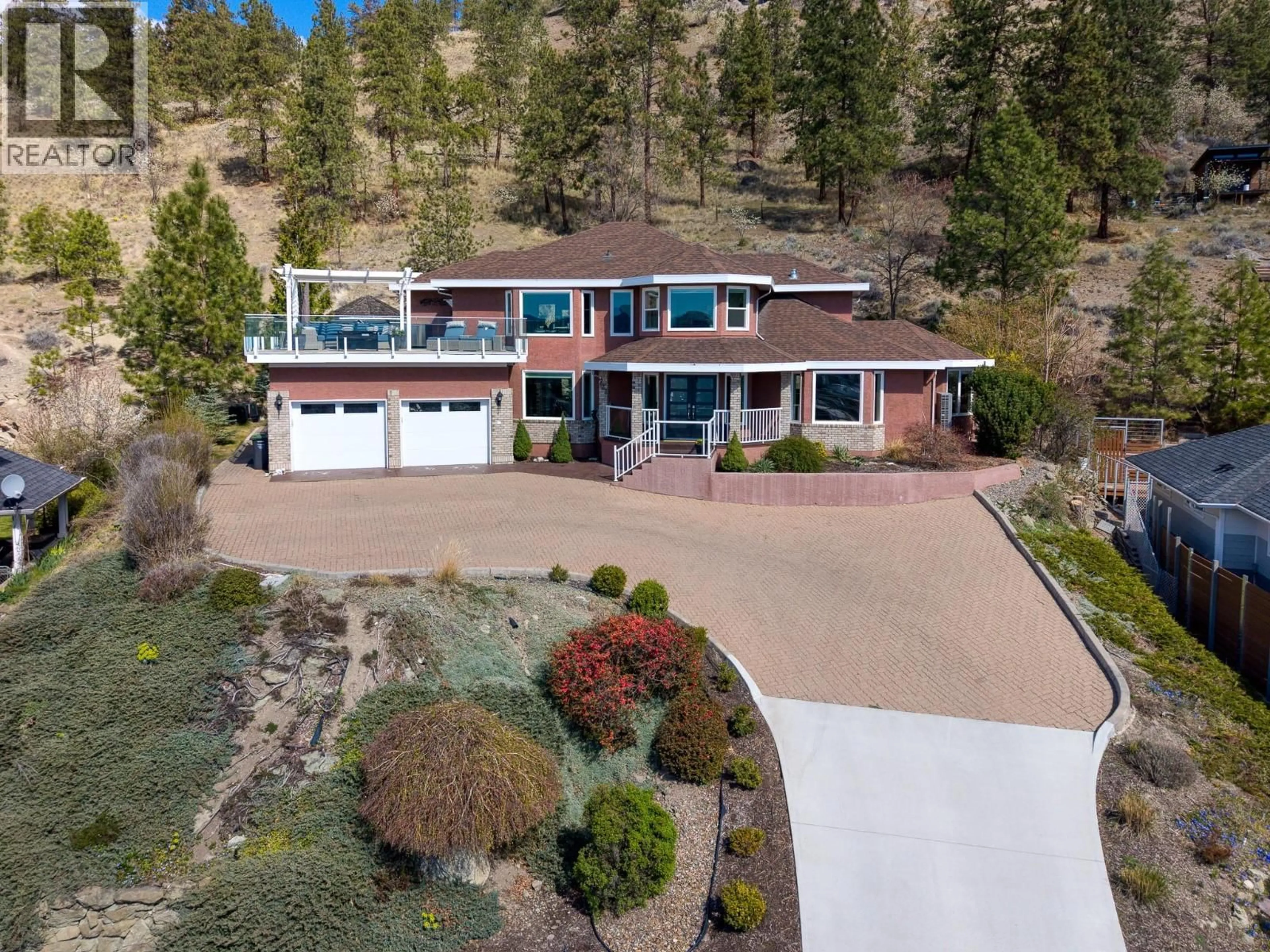A pic from outside/outdoor area/front of a property/back of a property/a pic from drone, unknown for 721 ROYAL PINE DRIVE, Kelowna British Columbia V1Y9G2