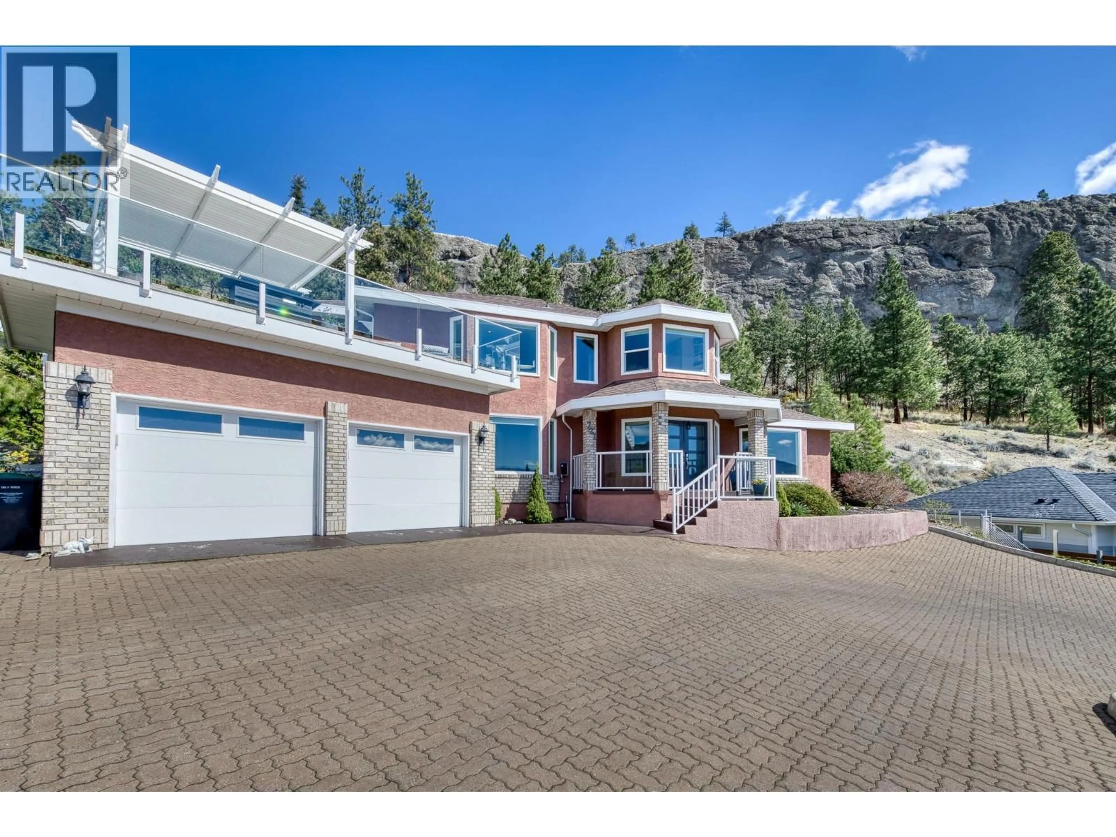 A pic from outside/outdoor area/front of a property/back of a property/a pic from drone, unknown for 721 ROYAL PINE DRIVE, Kelowna British Columbia V1Y9G2
