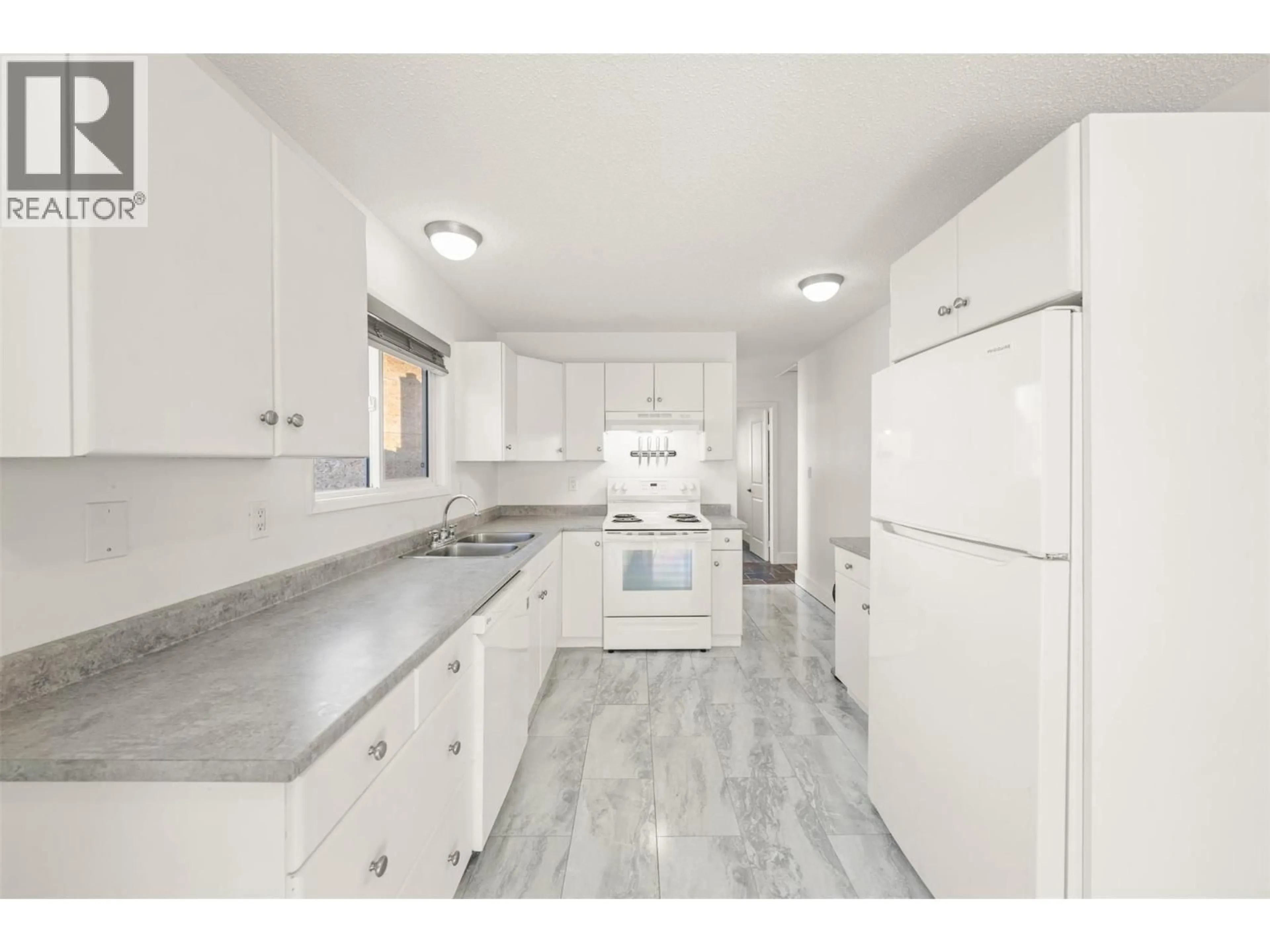 Standard kitchen, ceramic/tile floor for 3405 LOGAN ROAD, West Kelowna British Columbia V4T1N4