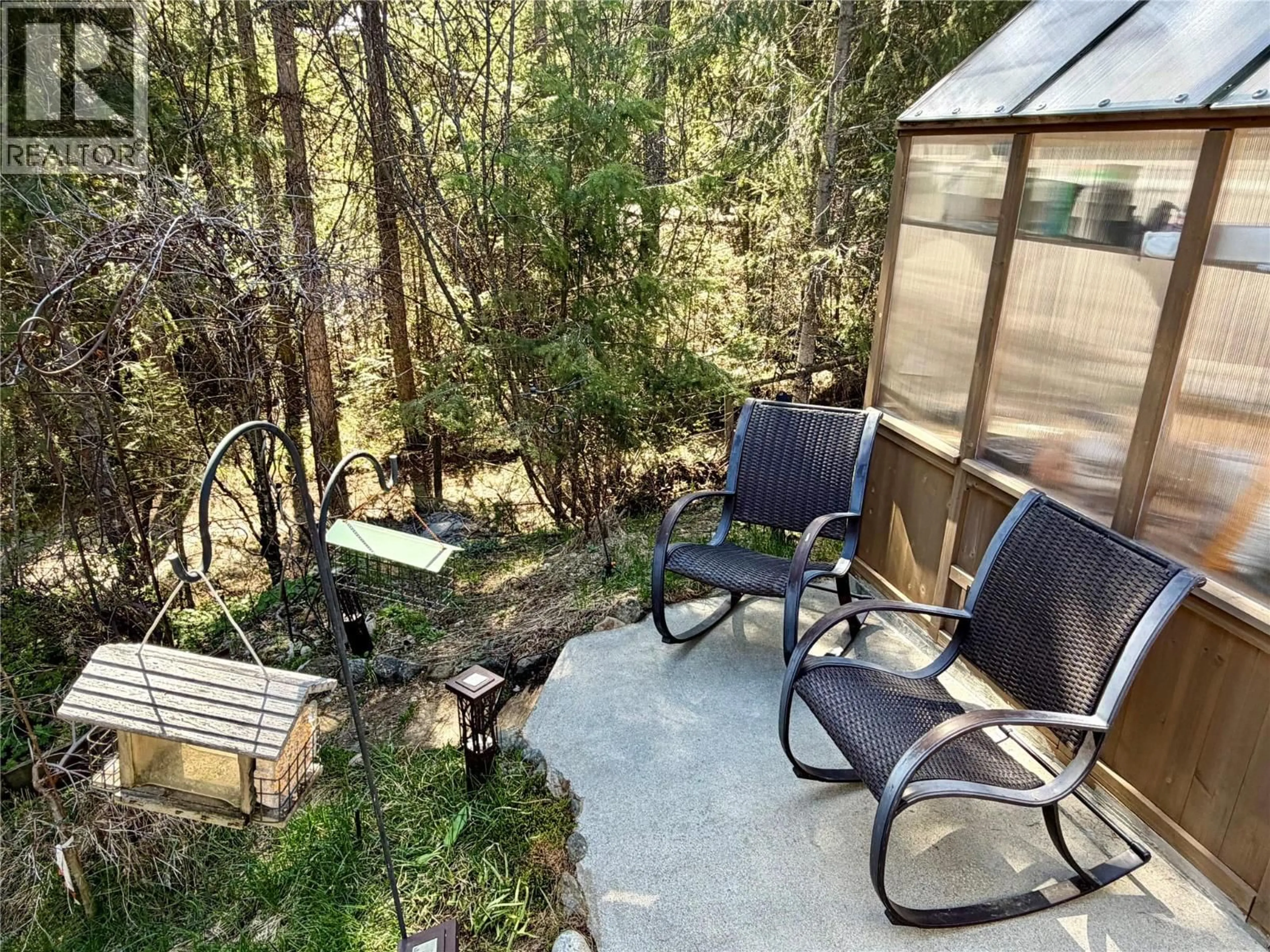 Patio, forest/trees view for 96 CHASE ROAD, Christina Lake British Columbia V0H1E0
