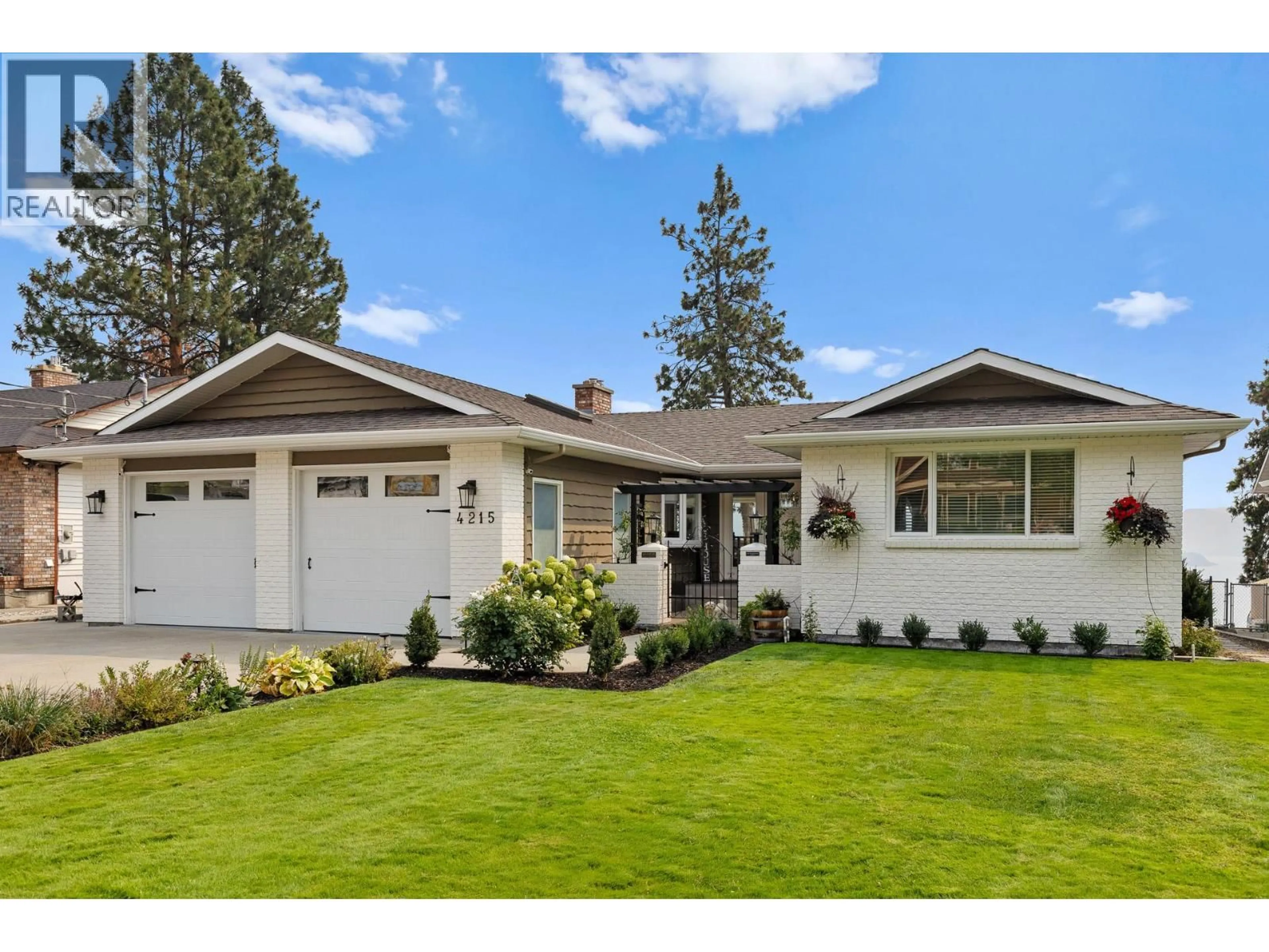 Home with vinyl exterior material, street for 4215 6TH AVENUE, Peachland British Columbia V0H1X5