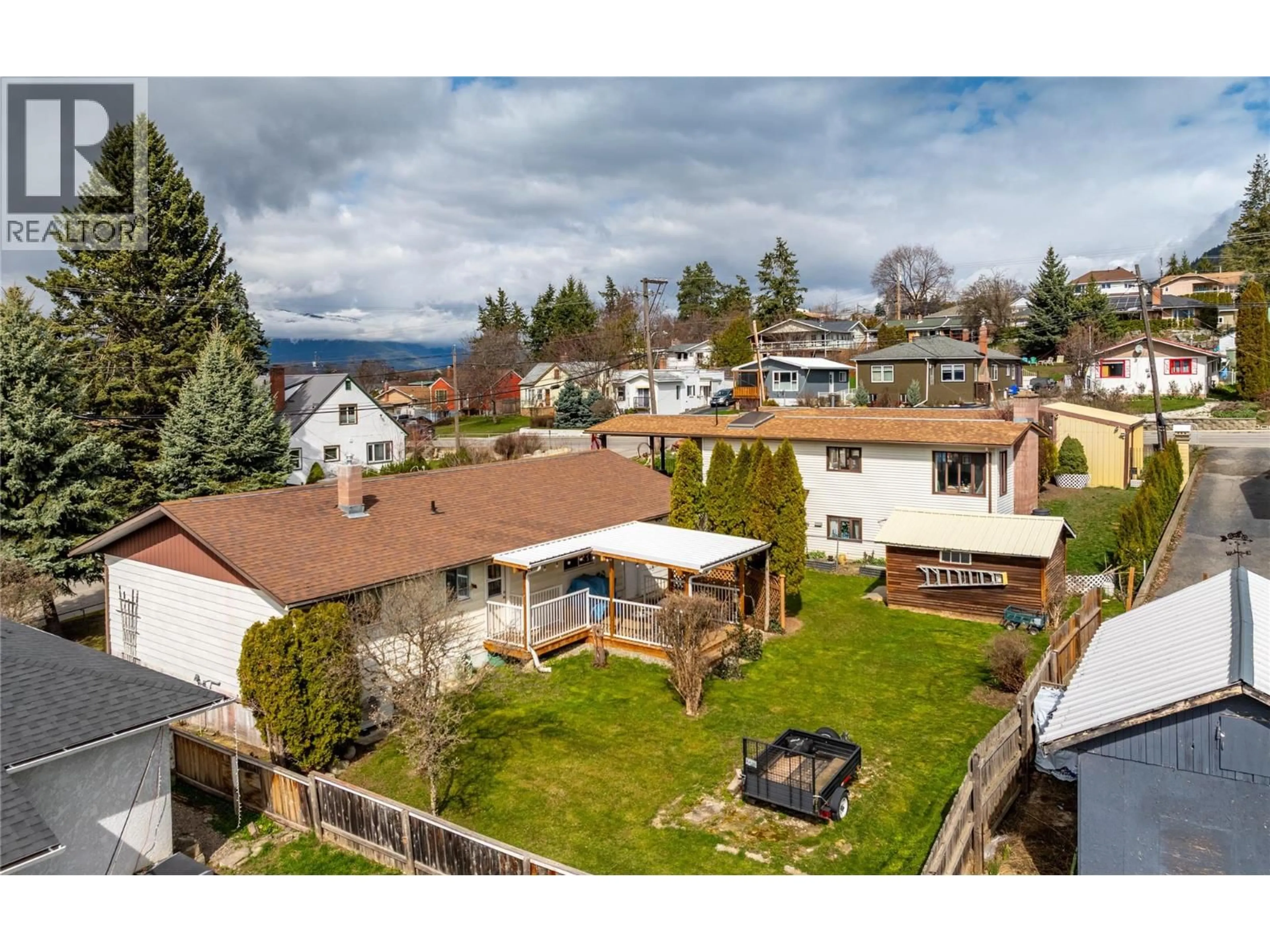 A pic from outside/outdoor area/front of a property/back of a property/a pic from drone, mountain view for 234 12TH AVENUE NORTH, Creston British Columbia V0B1G0