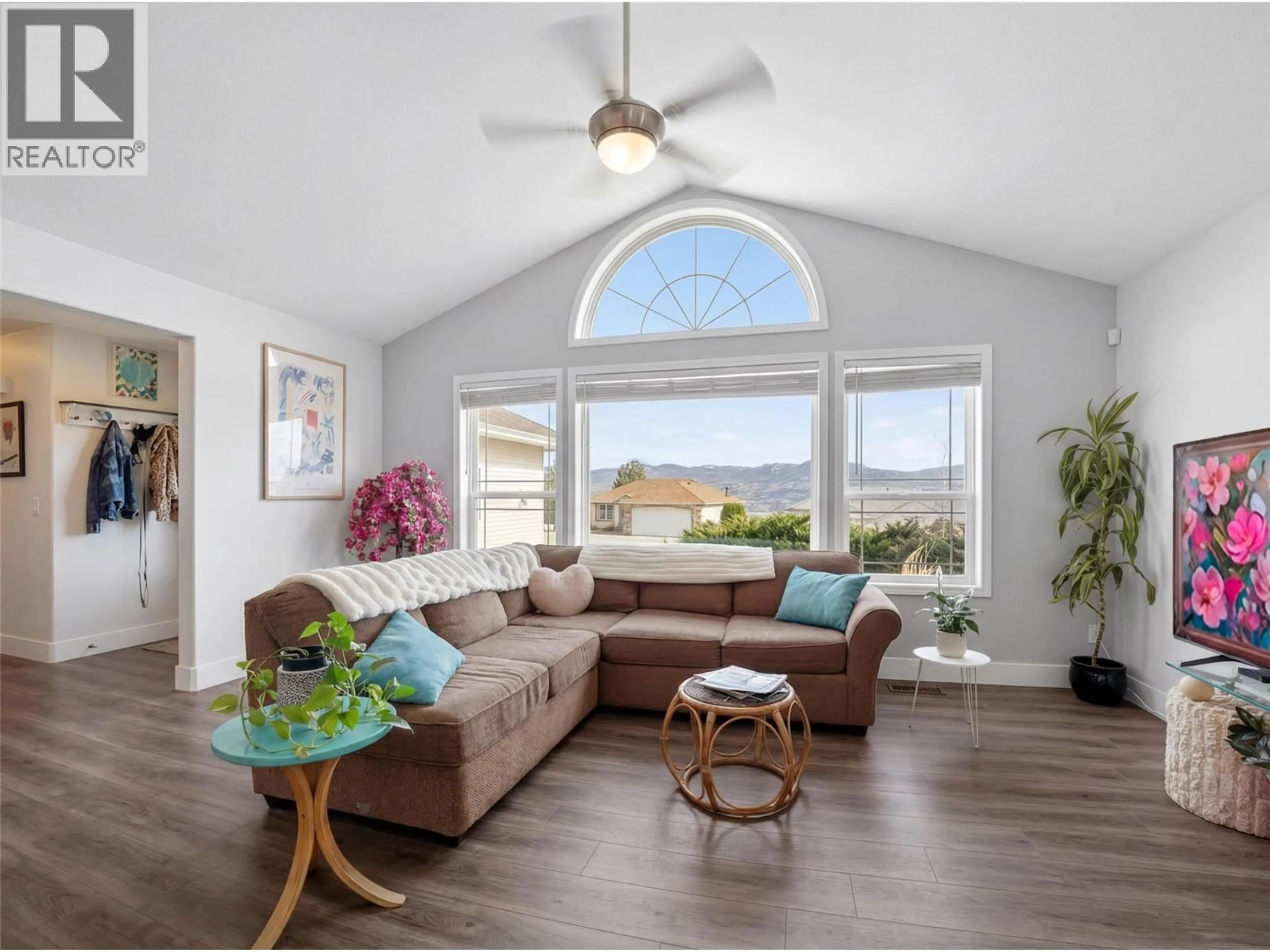 Living room with furniture, wood/laminate floor for 3026 WHISPERING HILLS DRIVE, West Kelowna British Columbia V4T2M9