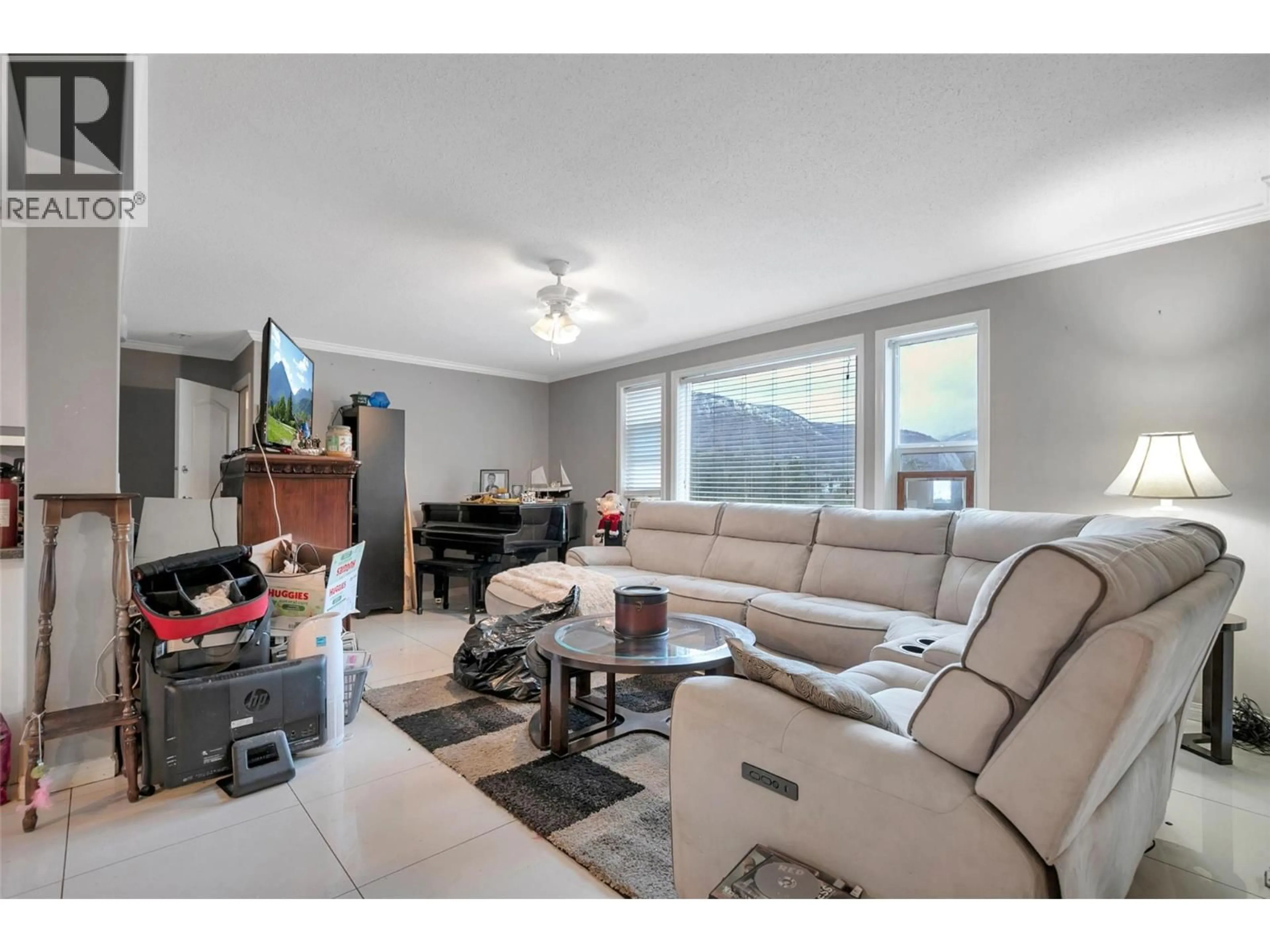 Living room with furniture, unknown for 1774 ALEC CRESCENT, Westbank British Columbia V4T2M5