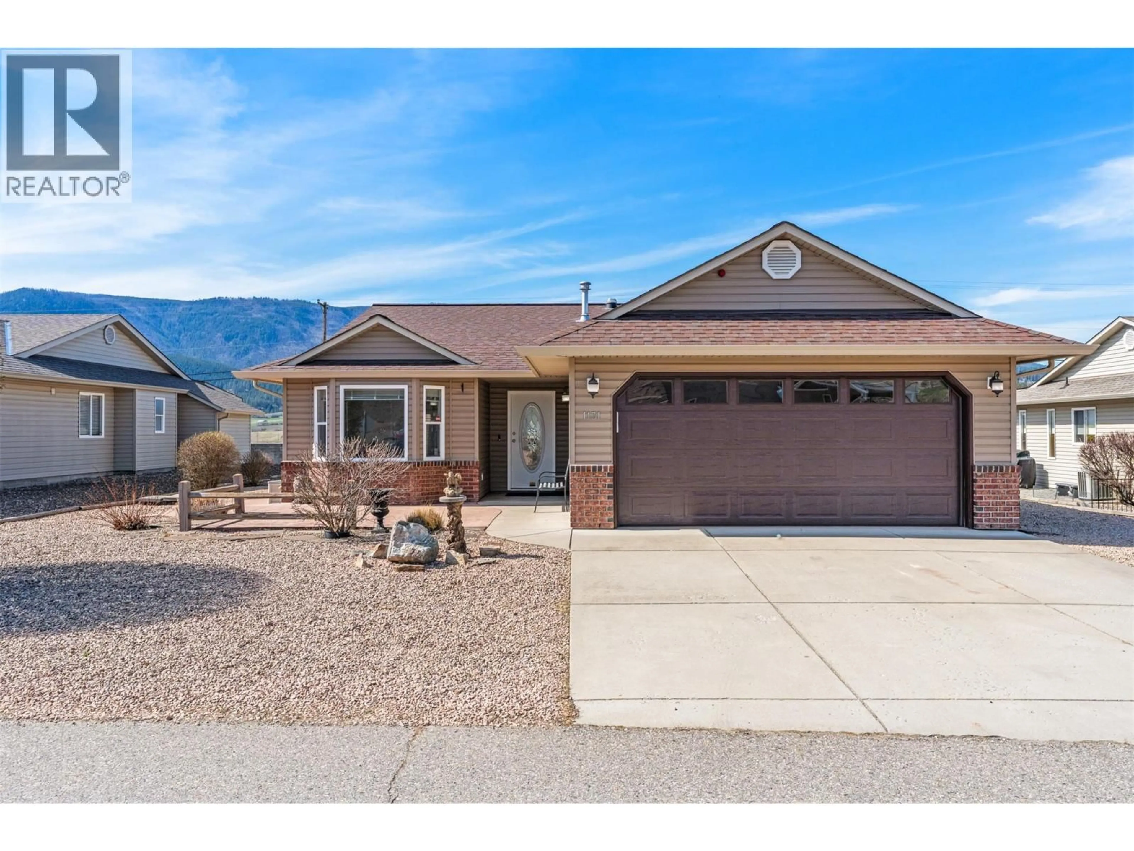 Home with vinyl exterior material, mountain view for 1131 1 STREET NORTH, Vernon British Columbia V1H1Z1