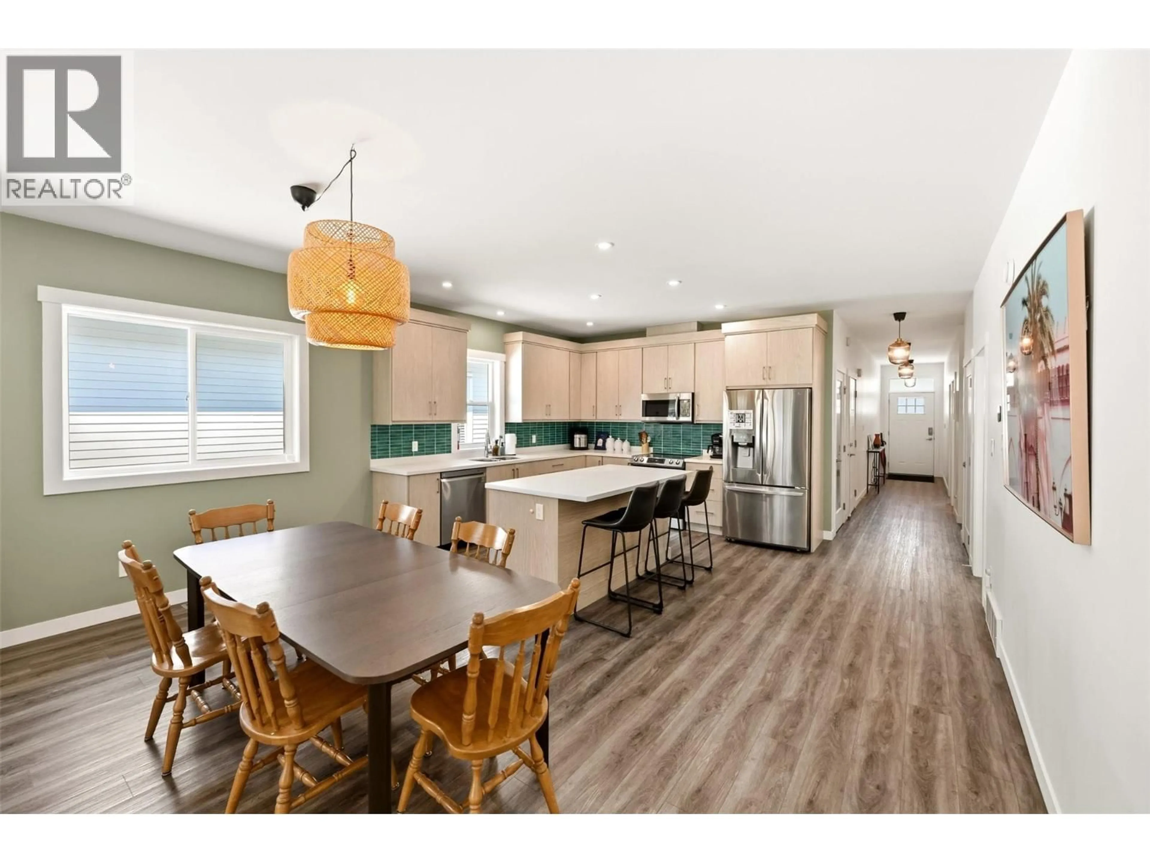 Open concept kitchen, wood/laminate floor for 397 10TH AVENUE, Keremeos British Columbia V0X1N3