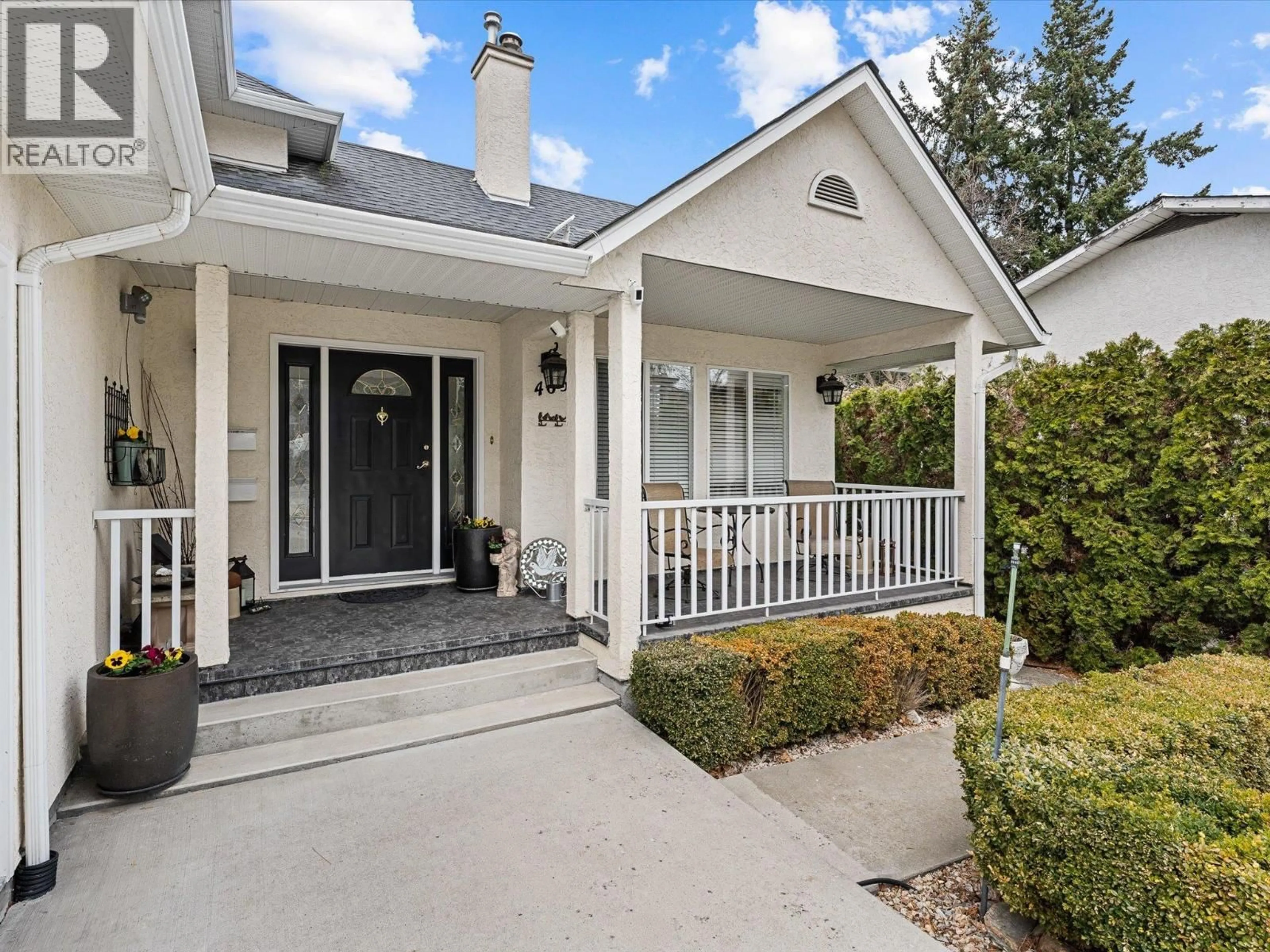 Home with vinyl exterior material, street for 4632 GORDON DRIVE, Kelowna British Columbia V1W1T6