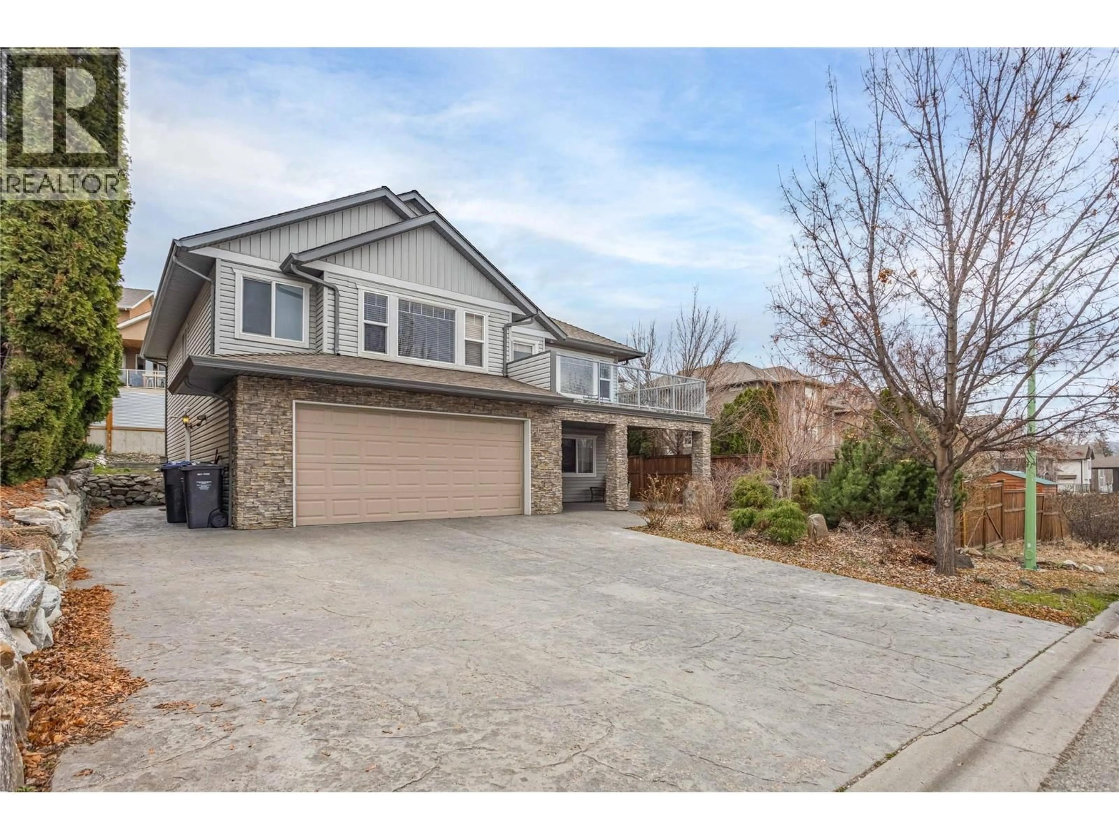 Home with brick exterior material, street for 607 LEFEVERE AVENUE, Kelowna British Columbia V1W5G7