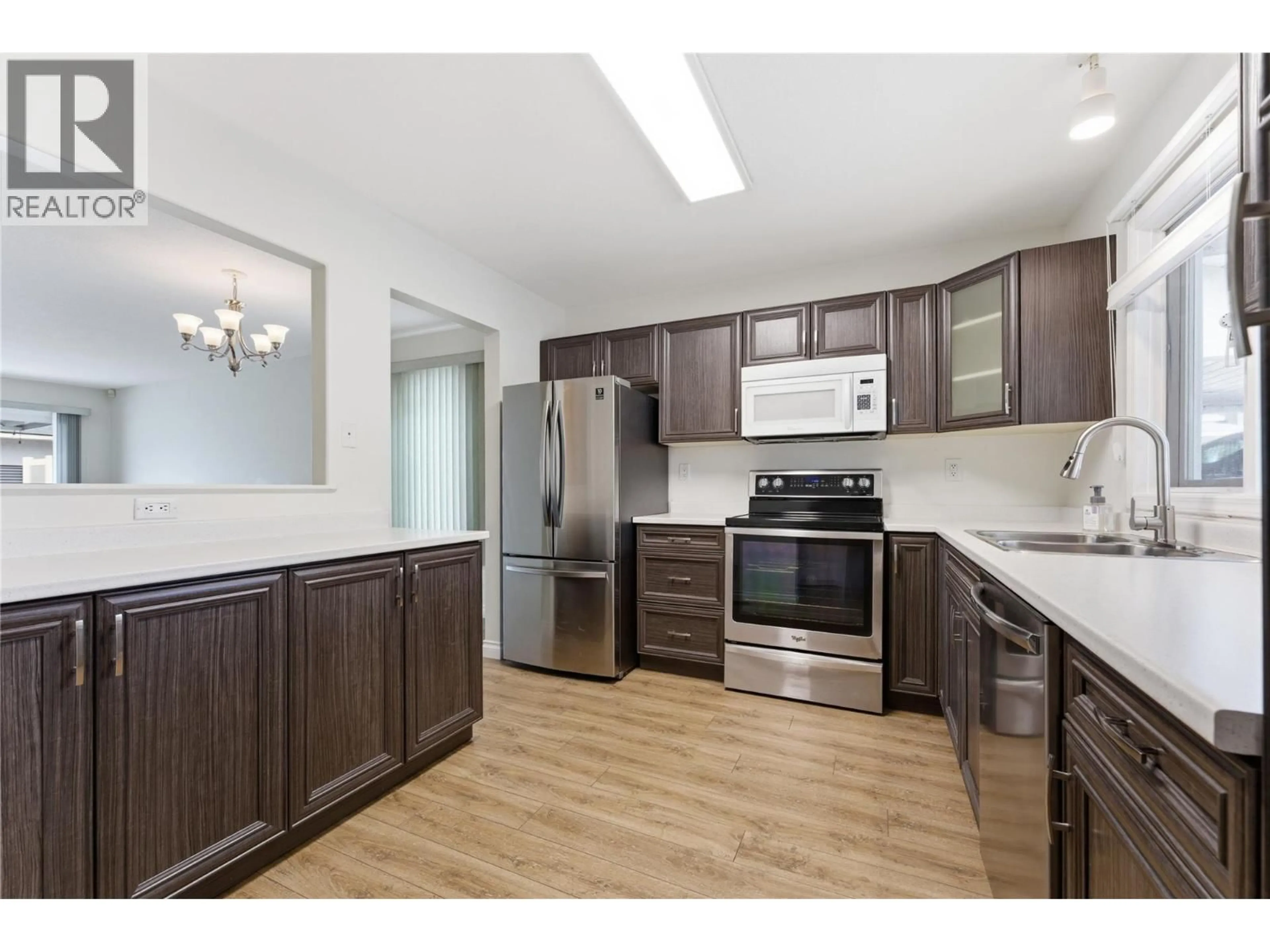 Standard kitchen, wood/laminate floor for 63 - 3900 27 AVENUE, Vernon British Columbia V1T9E6