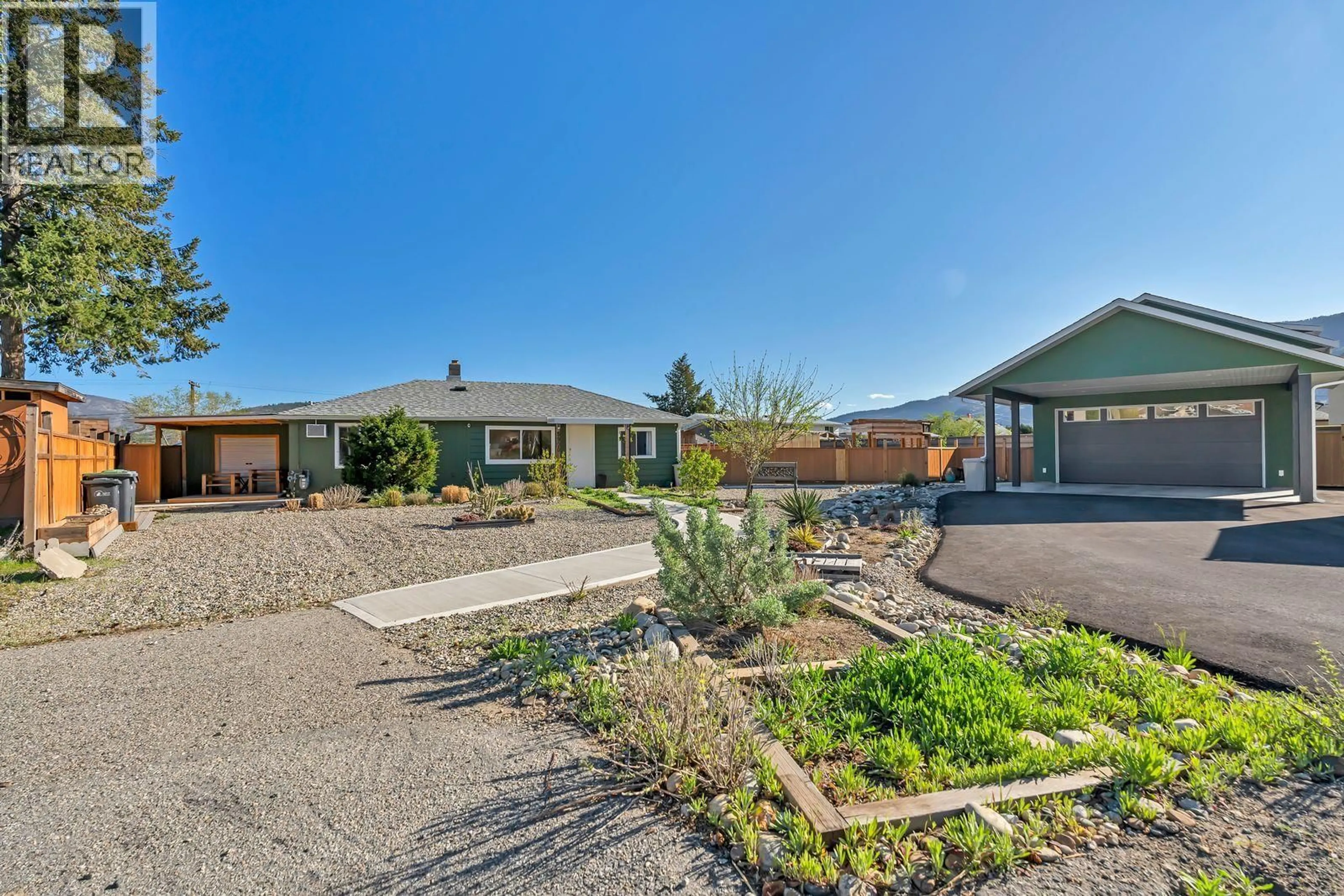 A pic from outside/outdoor area/front of a property/back of a property/a pic from drone, street for 5900 SHAMROCK PLACE, Oliver British Columbia V0H1T6