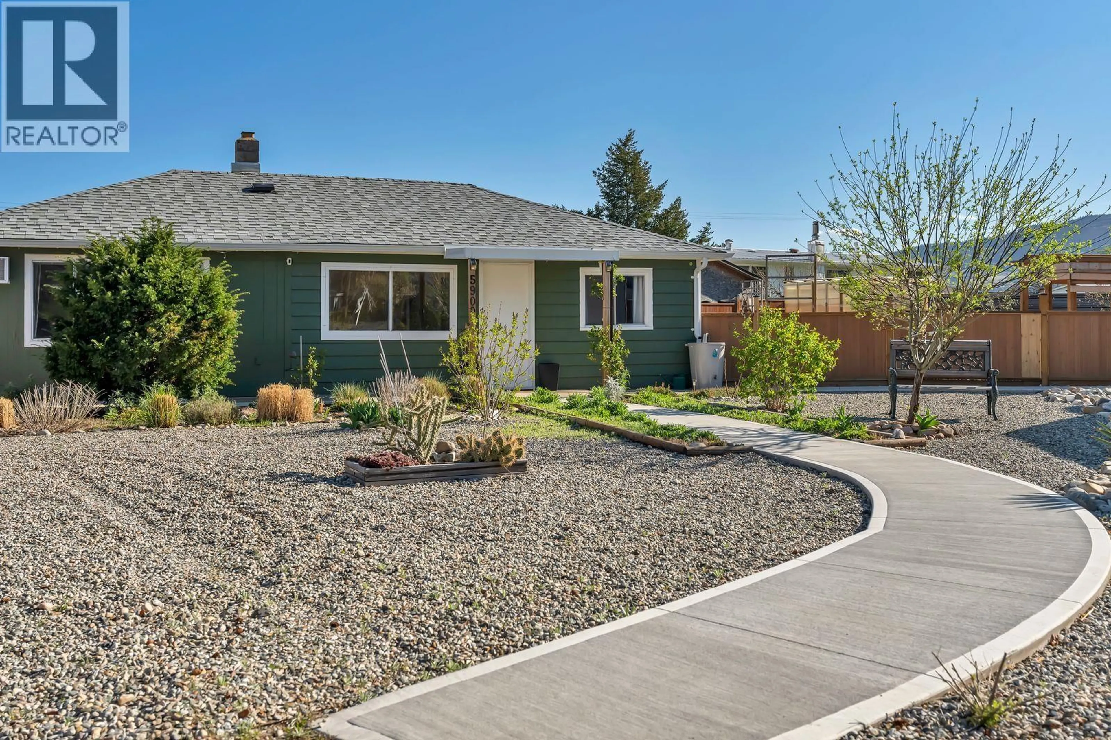 Home with vinyl exterior material, street for 5900 SHAMROCK PLACE, Oliver British Columbia V0H1T6