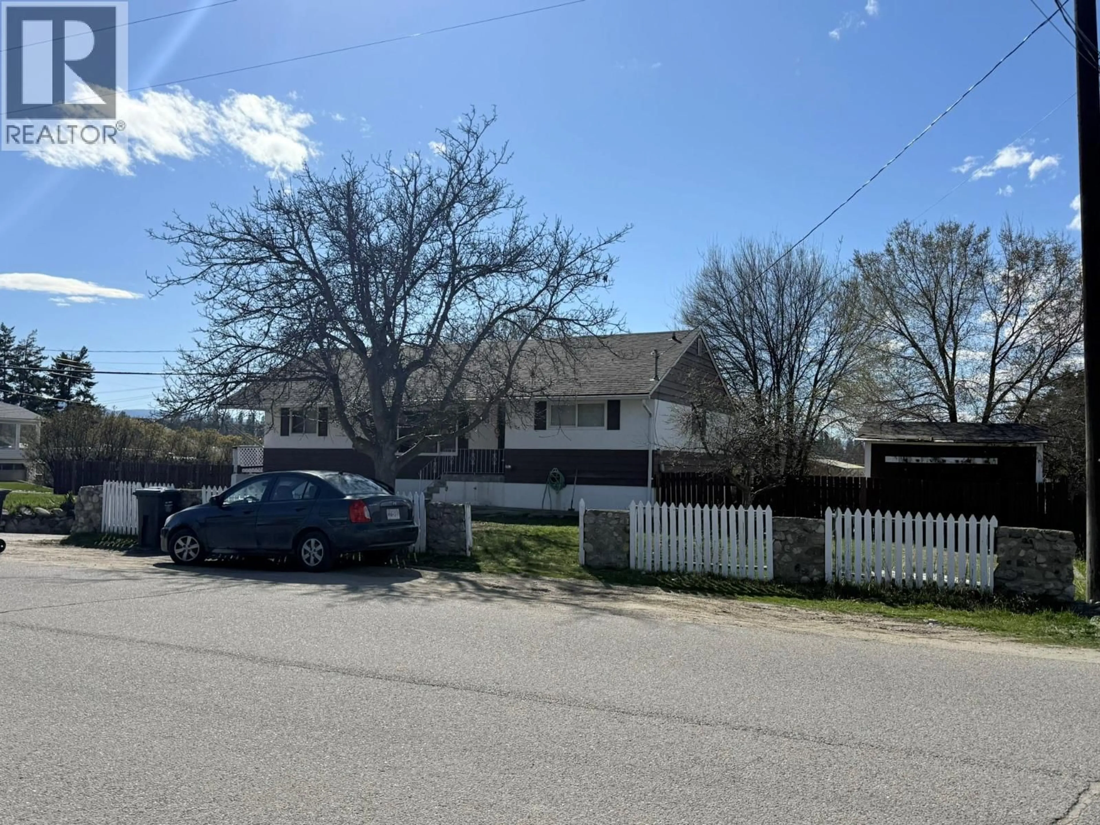 A pic from outside/outdoor area/front of a property/back of a property/a pic from drone, street for 770 CACTUS ROAD, Kelowna British Columbia V1X3N9