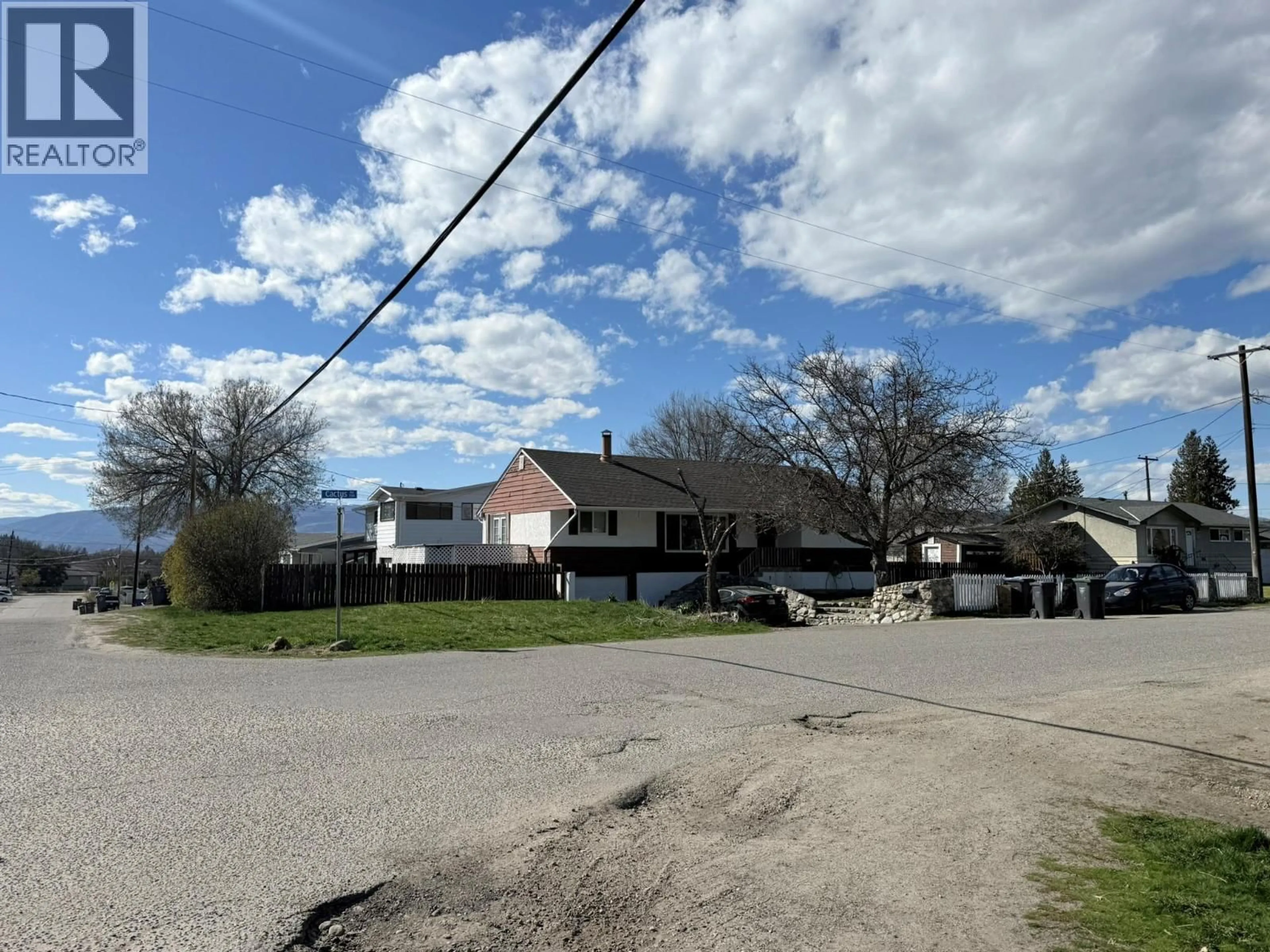 A pic from outside/outdoor area/front of a property/back of a property/a pic from drone, street for 770 CACTUS ROAD, Kelowna British Columbia V1X3N9
