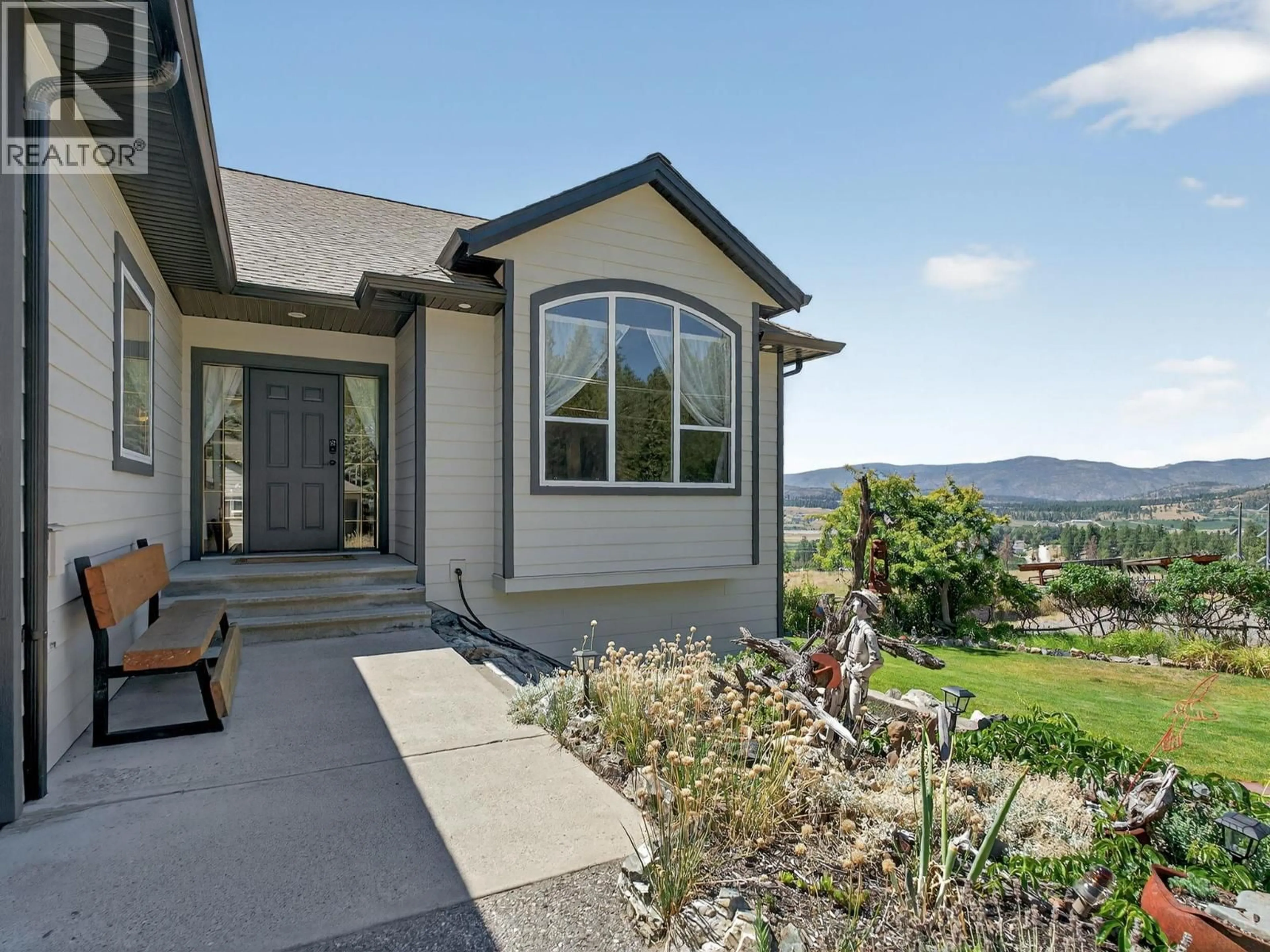 Home with vinyl exterior material, mountain view for 5955 POSTILL LAKE ROAD, Kelowna British Columbia V1X7V3