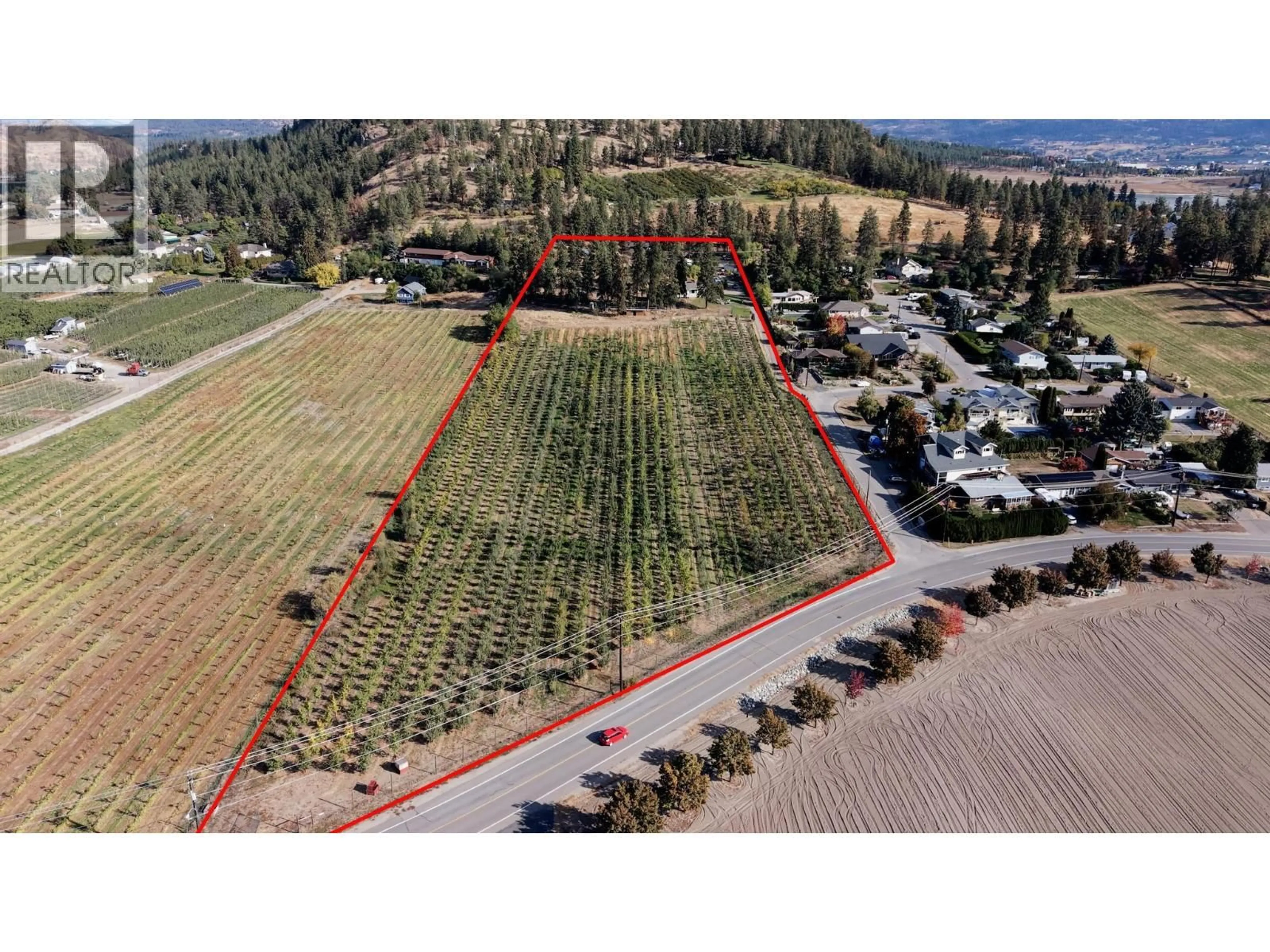 A pic from outside/outdoor area/front of a property/back of a property/a pic from drone, unknown for 590 BRENDA ROAD, Kelowna British Columbia V1V2C8