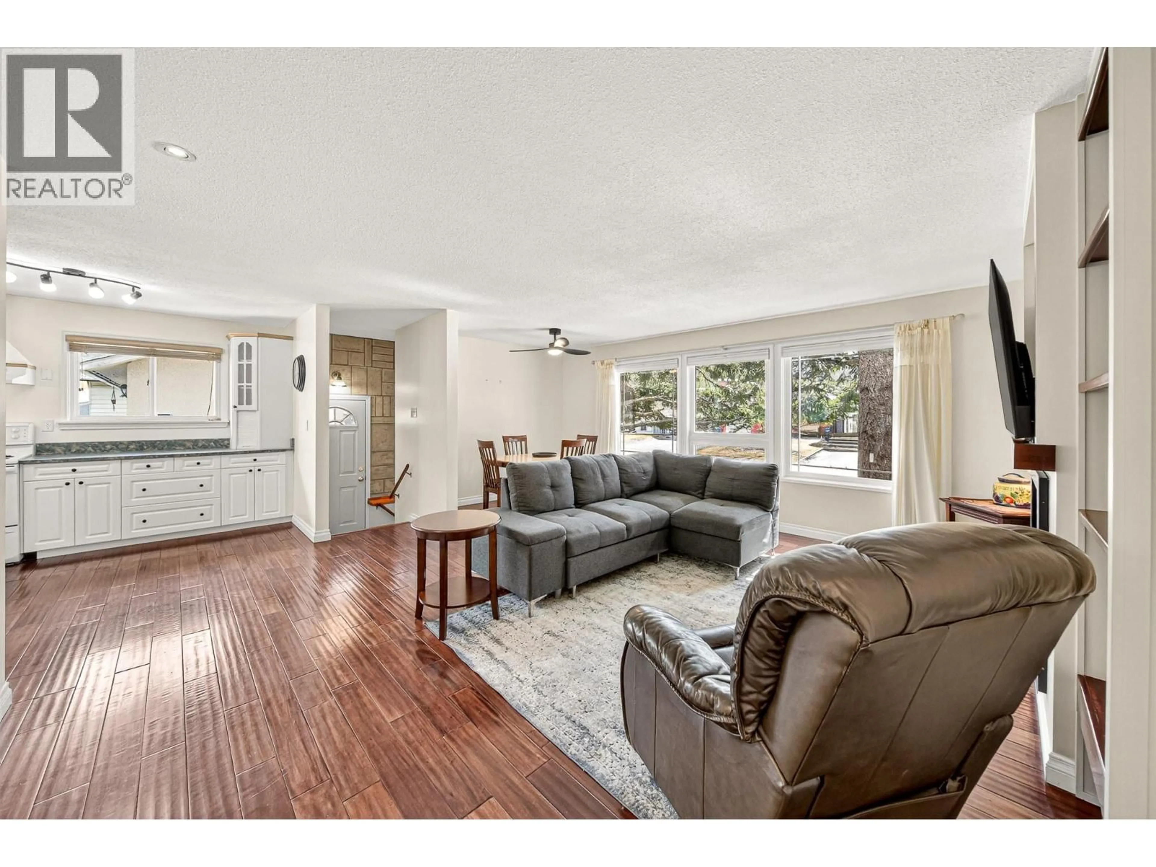 Living room with furniture, wood/laminate floor for 451 WHITE BIRCH CRESCENT, Sparwood British Columbia V0B2G1