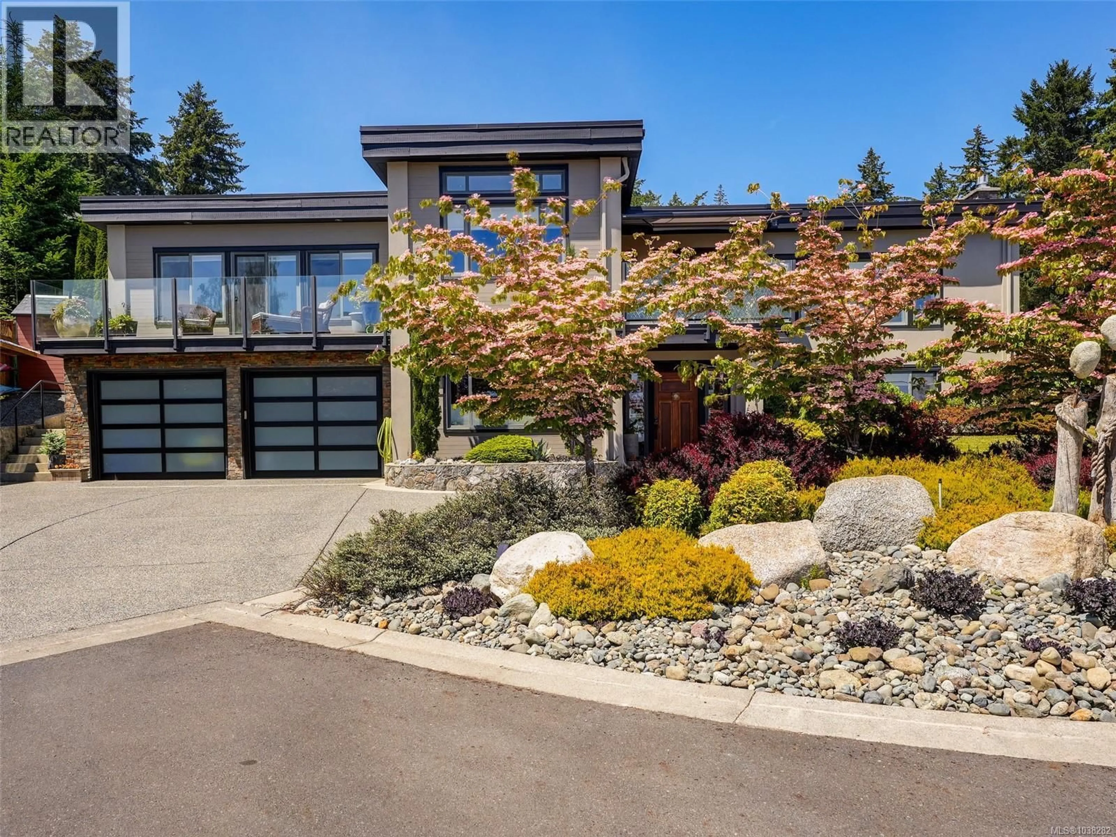 Home with brick exterior material, street for 2491 CADBORO HEIGHTS LANE, Saanich British Columbia V8N0B2