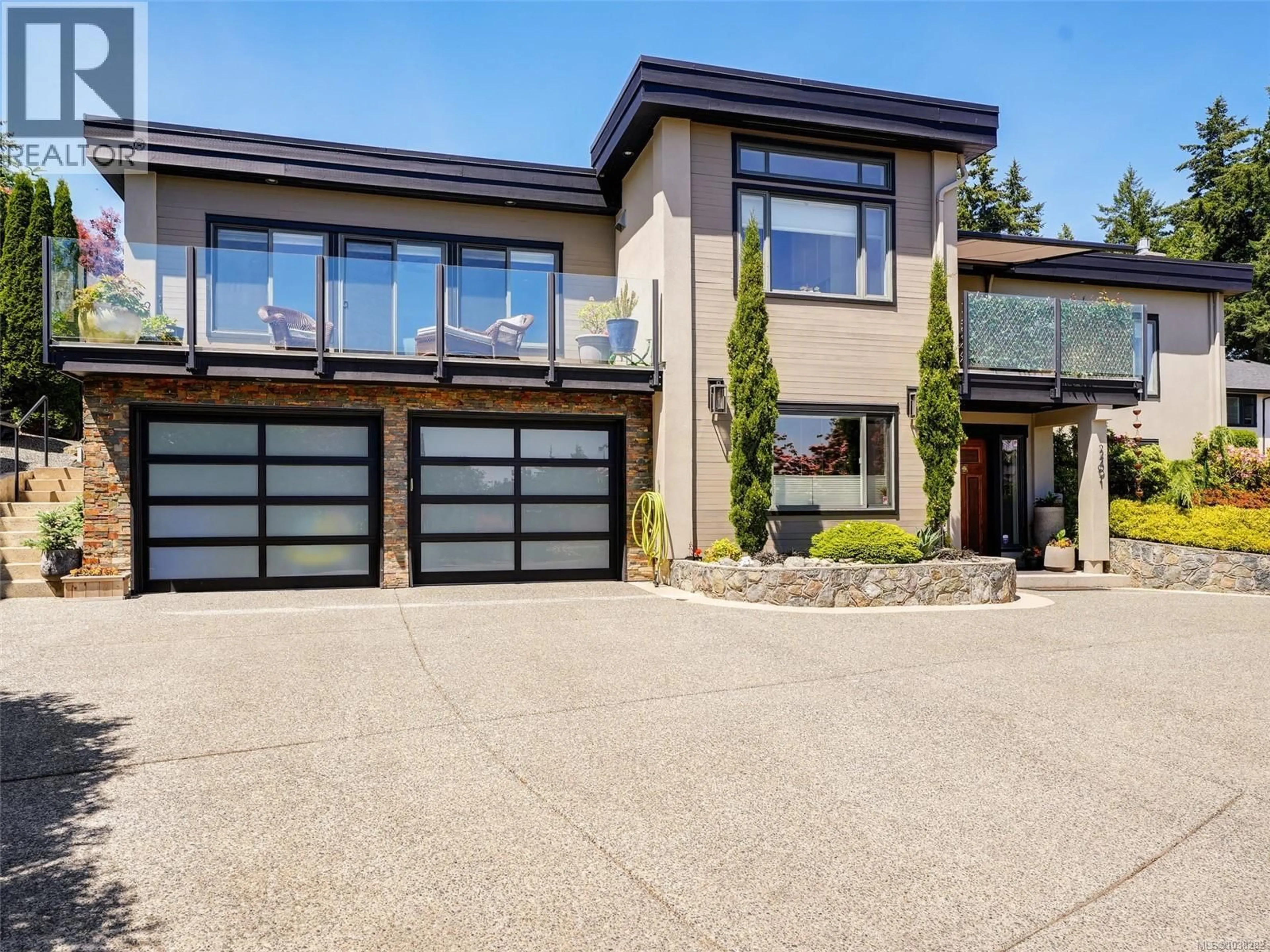 Home with brick exterior material, street for 2491 CADBORO HEIGHTS LANE, Saanich British Columbia V8N0B2