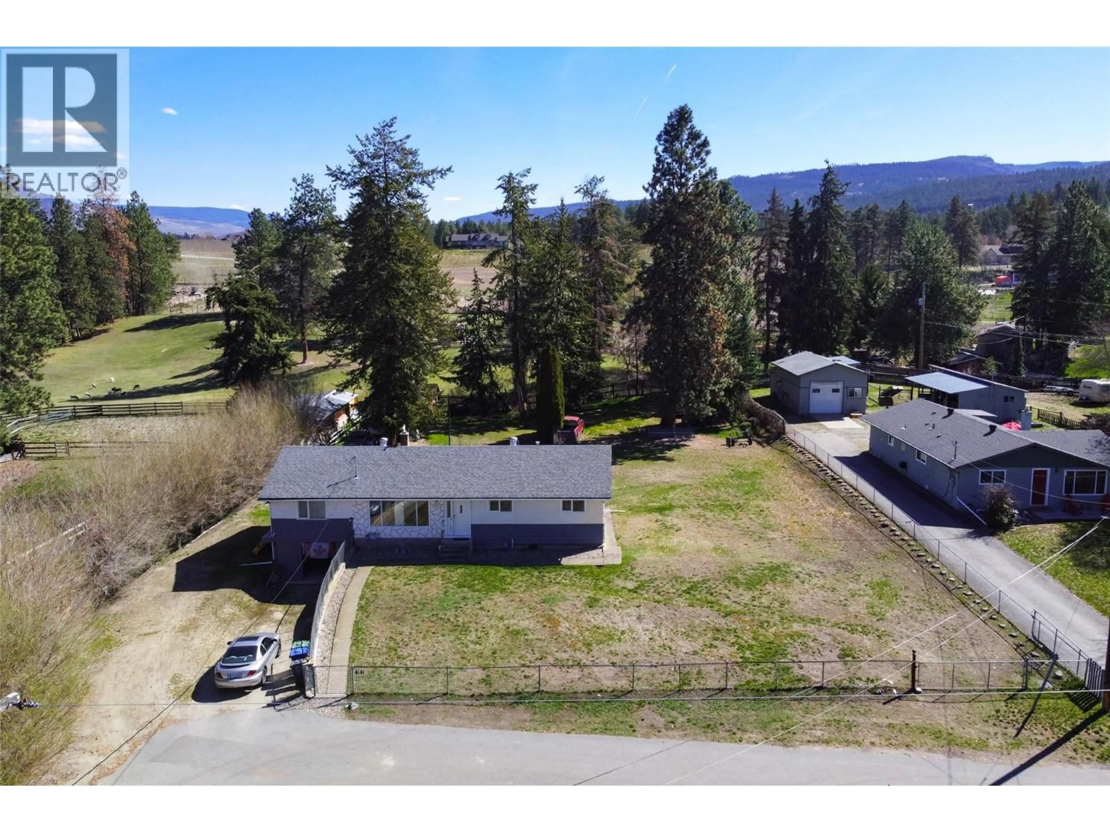 A pic from outside/outdoor area/front of a property/back of a property/a pic from drone, mountain view for 4141 SEALY ROAD, Kelowna British Columbia V1W4C4