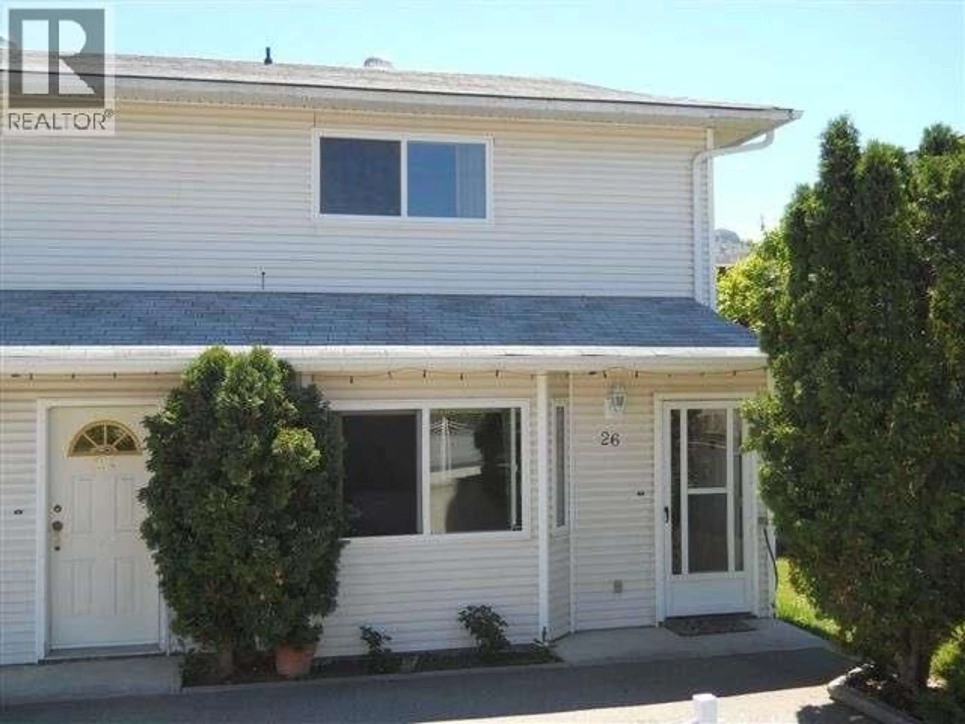 Home with vinyl exterior material, street for 26 CACTUS CRESCENT, Osoyoos British Columbia V0H1V1