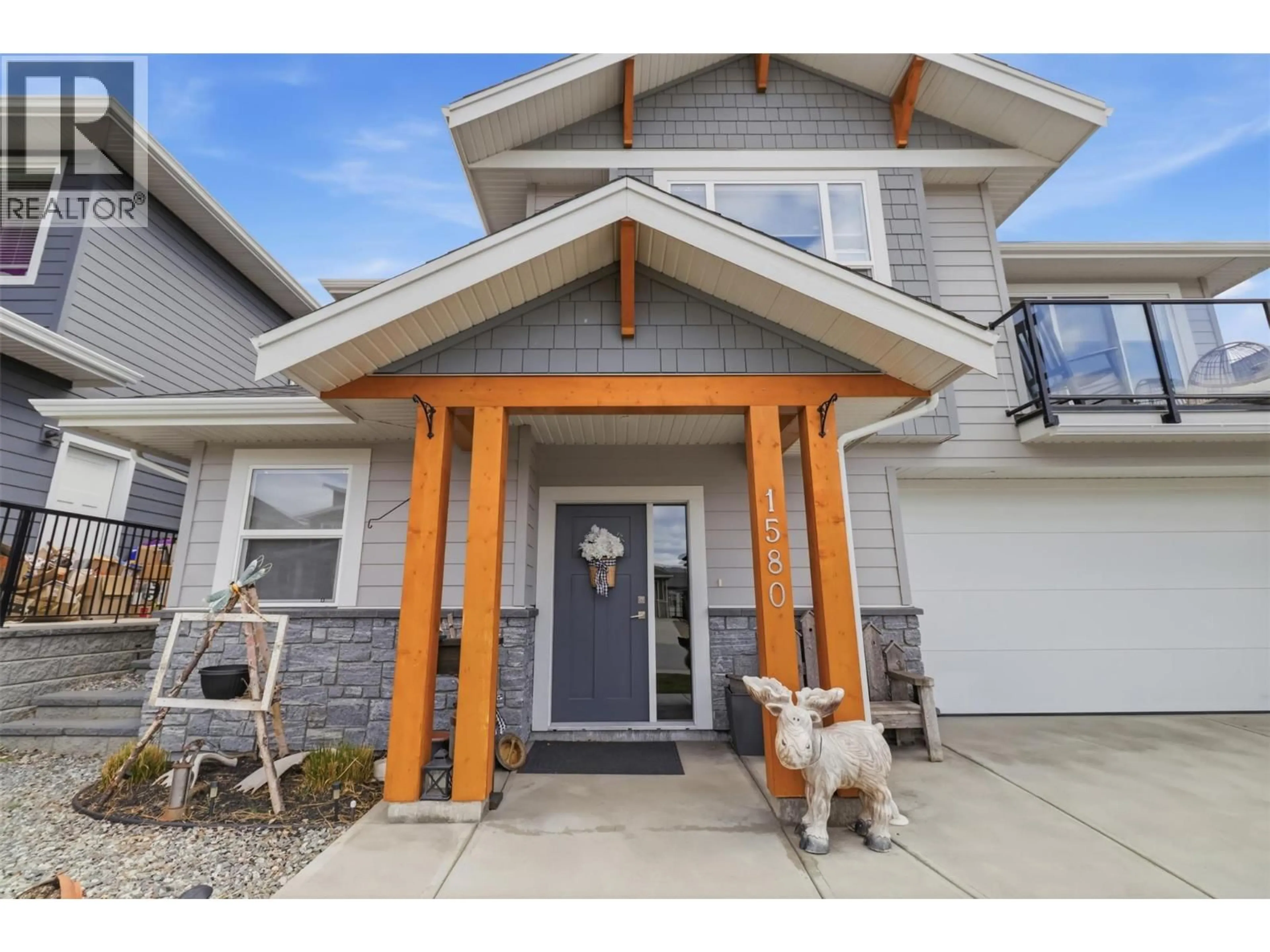 Home with vinyl exterior material, street for 1580 EMERALD DRIVE, Kamloops British Columbia V2E0C1