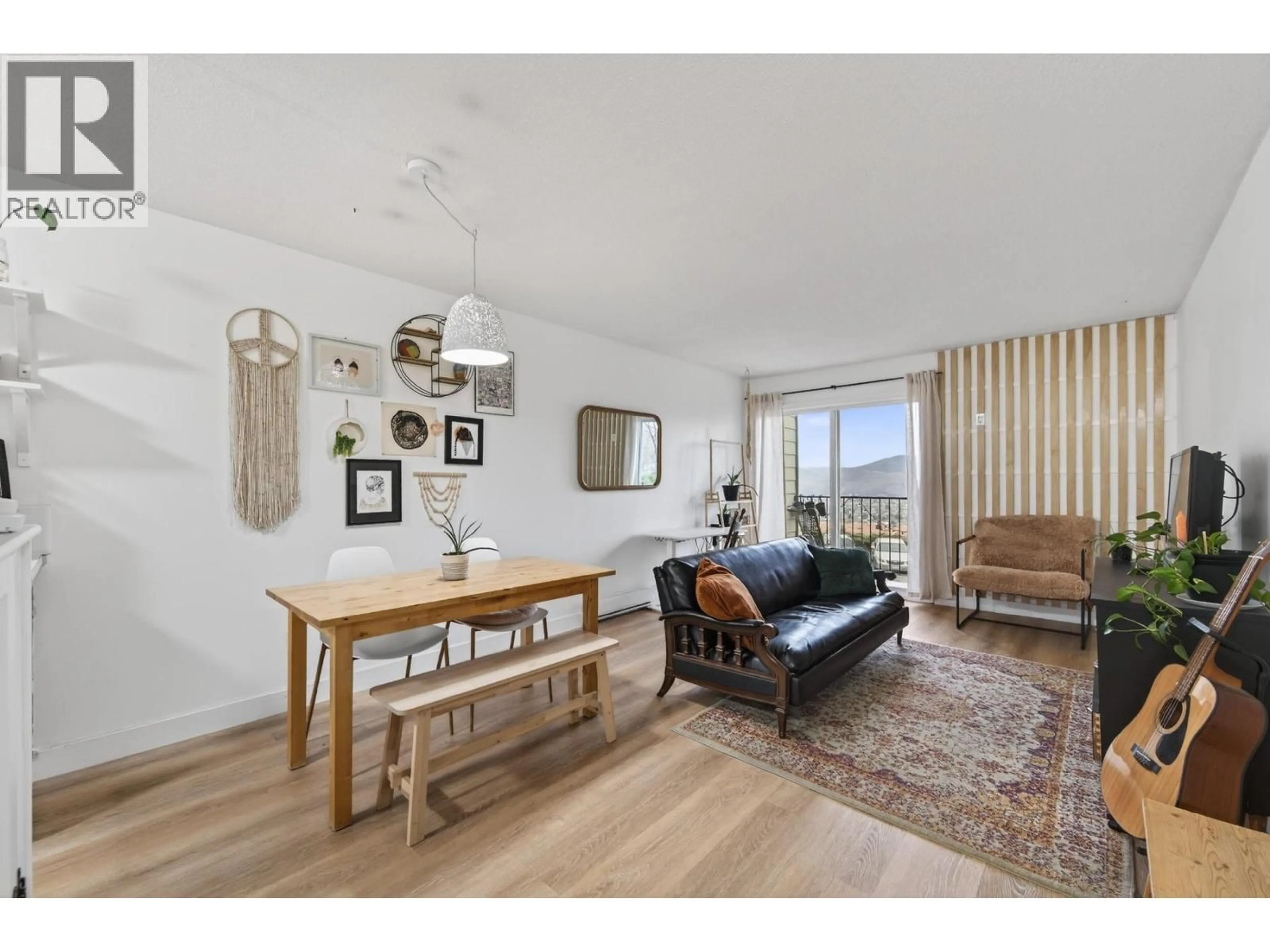 Living room with furniture, wood/laminate floor for 107 - 751 GRANDVIEW TERRACE, Kamloops British Columbia V2C6C9