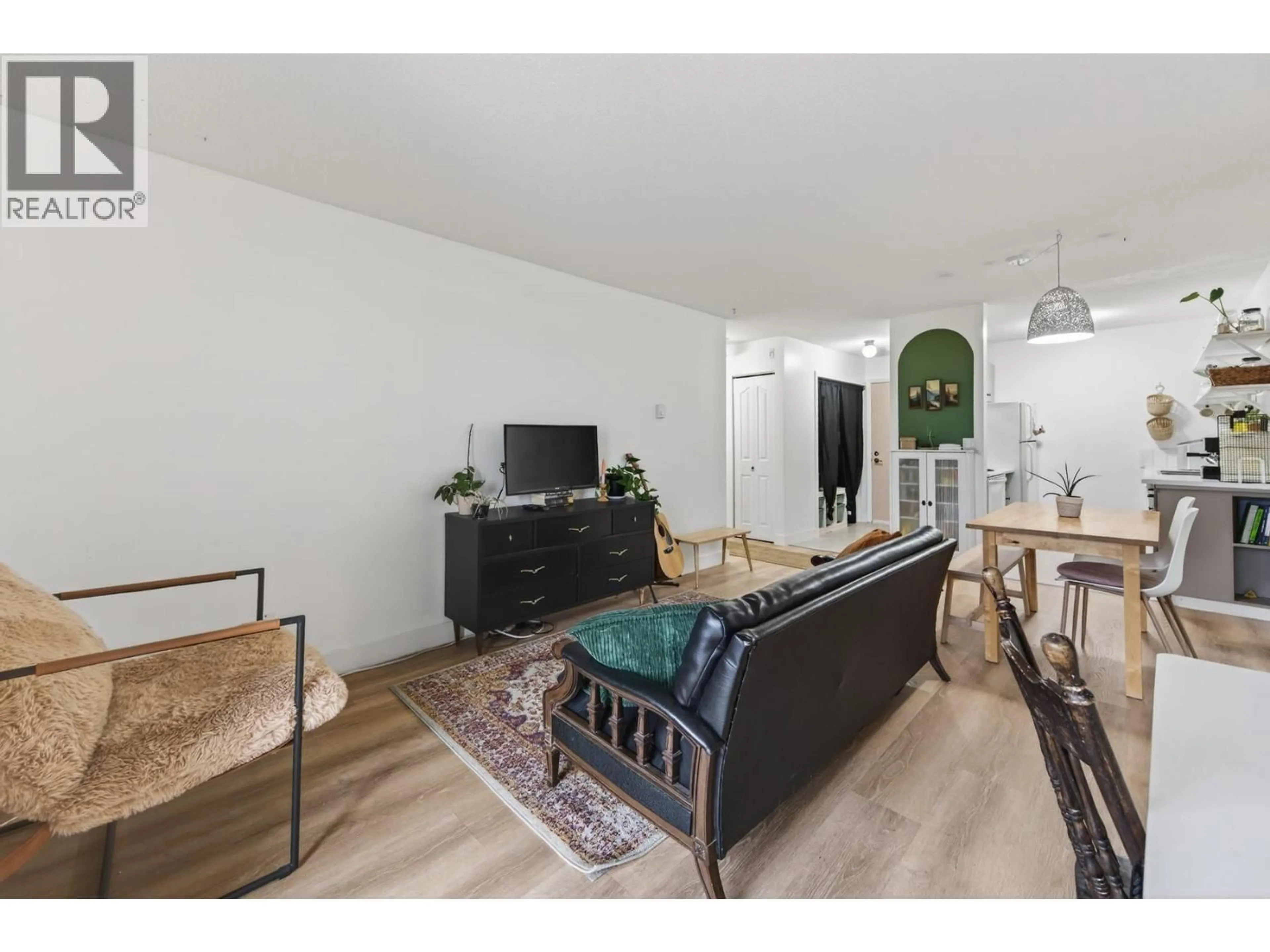 Living room with furniture, wood/laminate floor for 107 - 751 GRANDVIEW TERRACE, Kamloops British Columbia V2C6C9