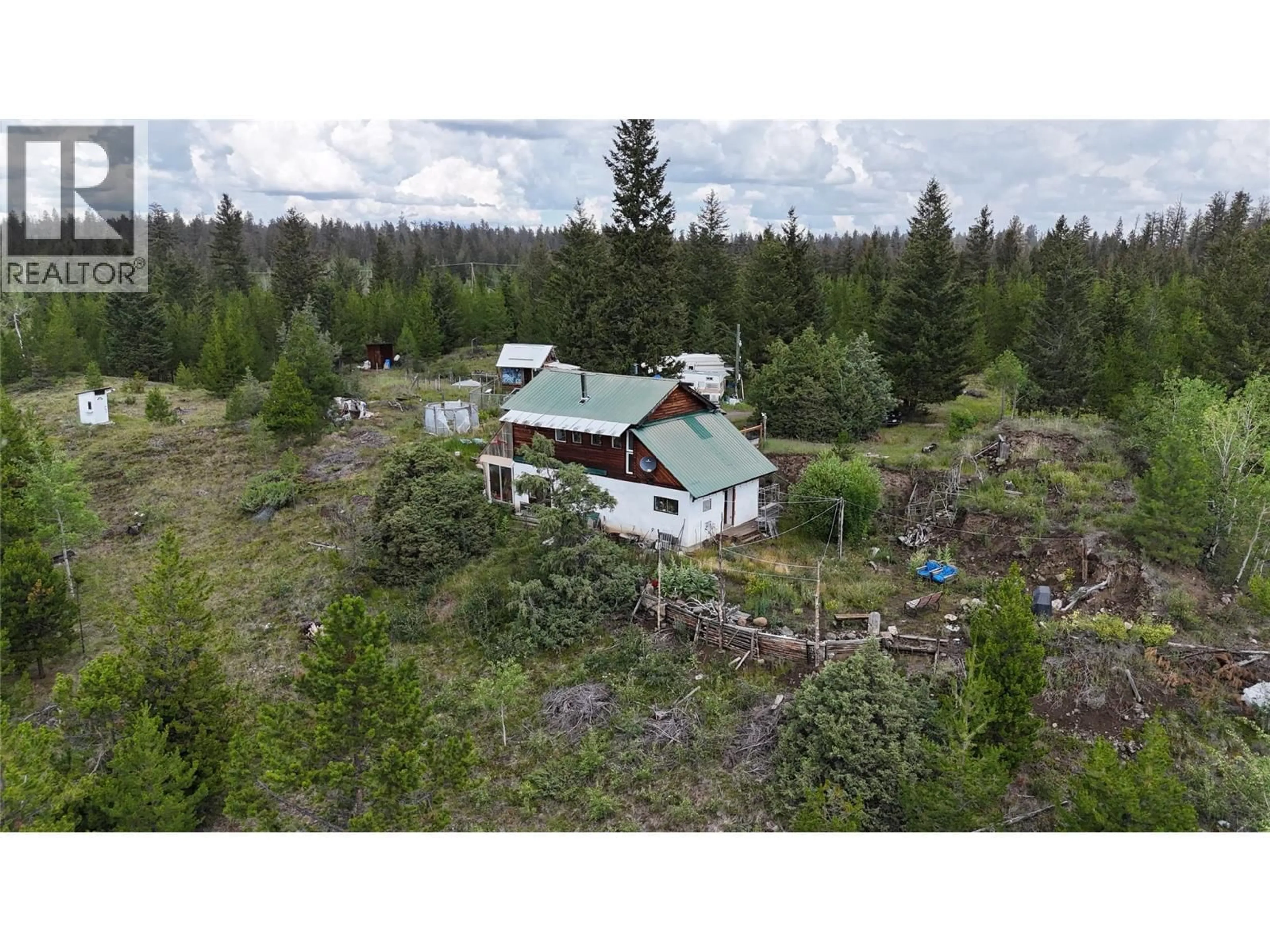 A pic from outside/outdoor area/front of a property/back of a property/a pic from drone, forest/trees view for 1400 CHASM ROAD, 70 Mile House British Columbia V0K1K0