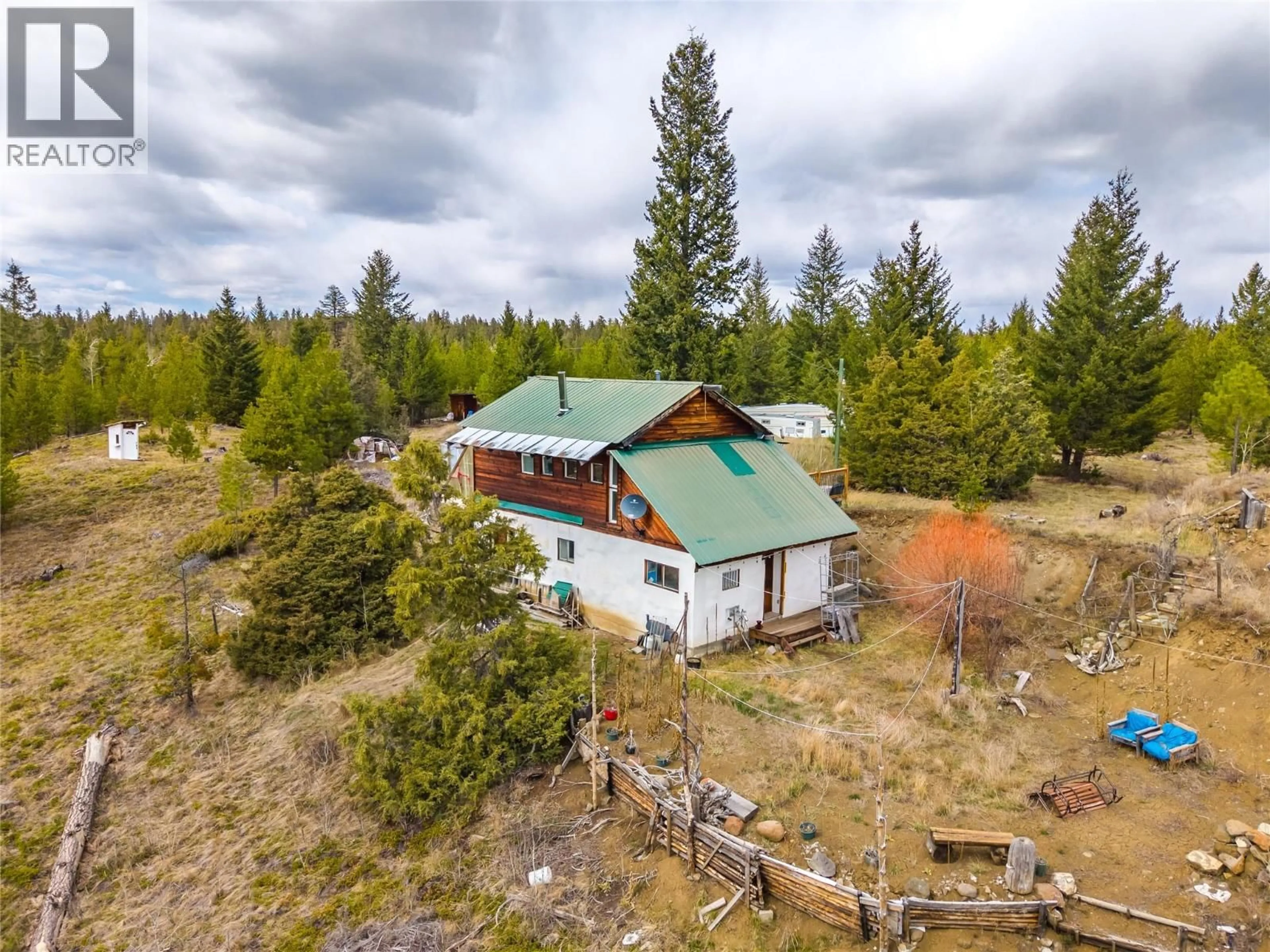 A pic from outside/outdoor area/front of a property/back of a property/a pic from drone, forest/trees view for 1400 CHASM ROAD, 70 Mile House British Columbia V0K1K0