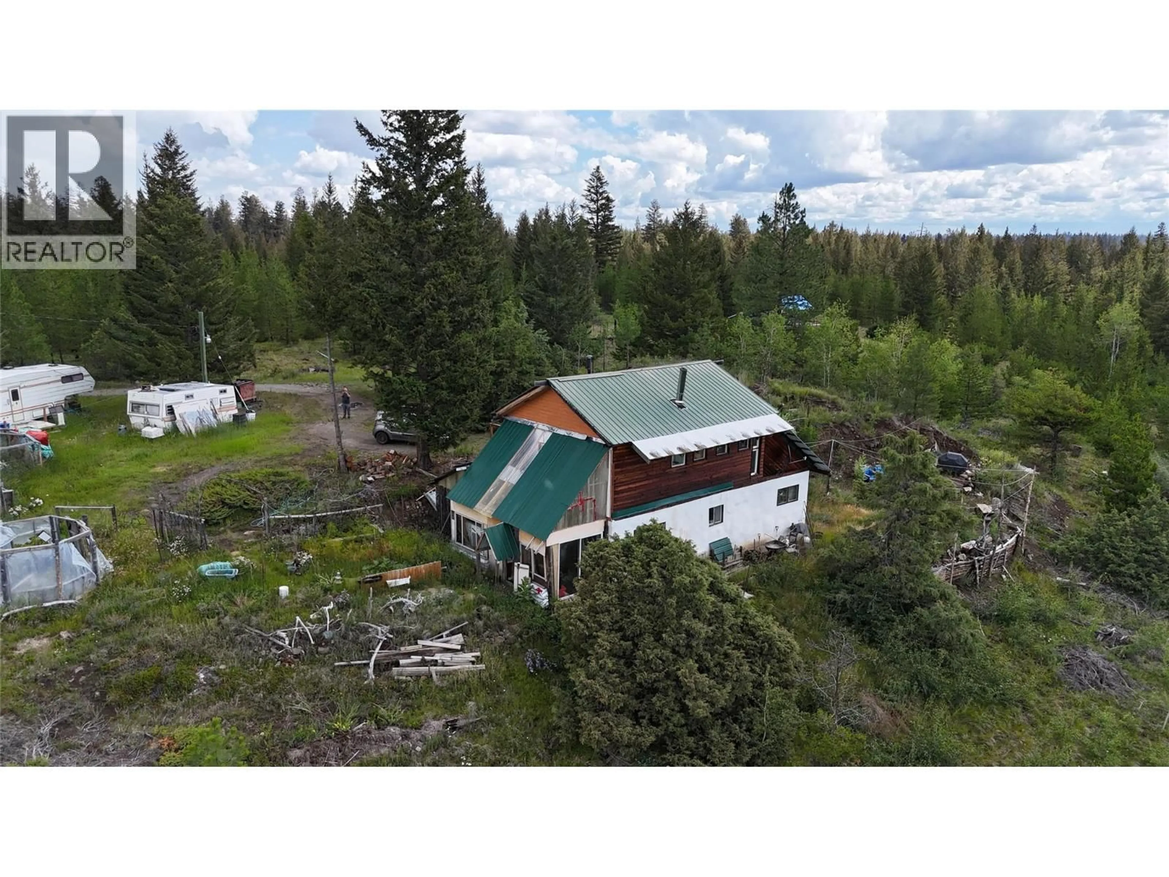 A pic from outside/outdoor area/front of a property/back of a property/a pic from drone, unknown for 1400 CHASM ROAD, 70 Mile House British Columbia V0K1K0