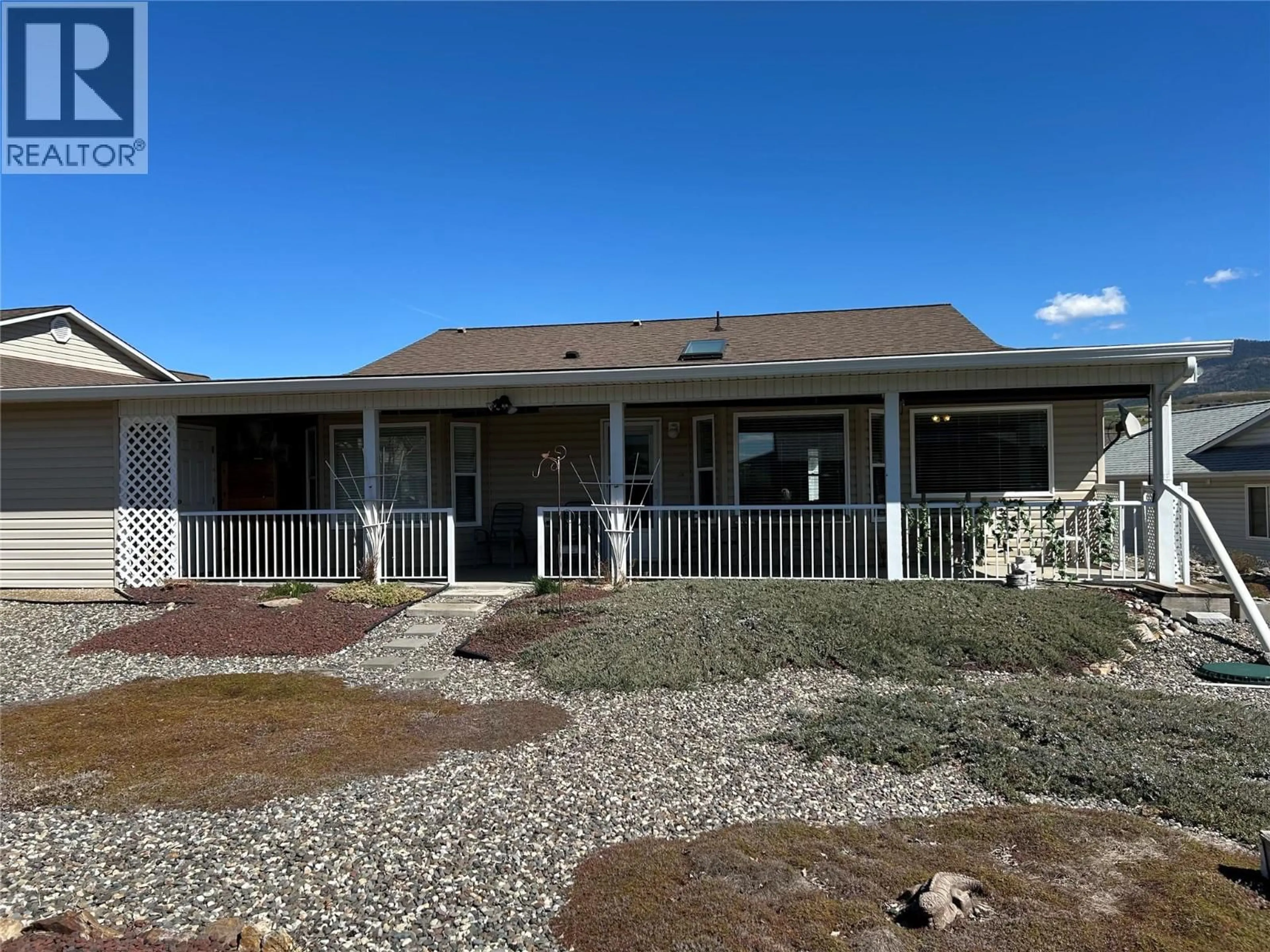 A pic from outside/outdoor area/front of a property/back of a property/a pic from drone, unknown for 851 8 AVENUE, Vernon British Columbia V1H1Z1