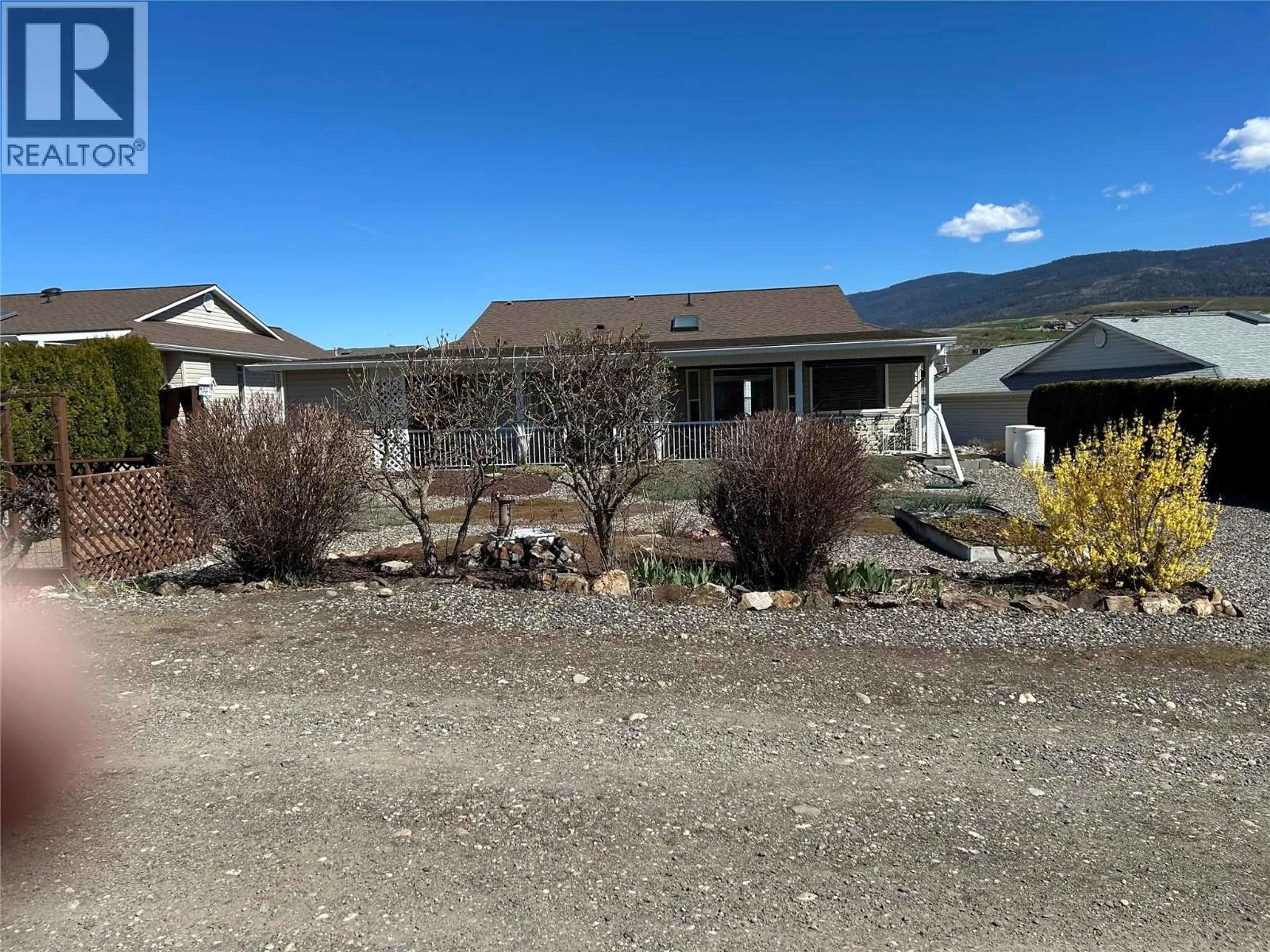 A pic from outside/outdoor area/front of a property/back of a property/a pic from drone, mountain view for 851 8 AVENUE, Vernon British Columbia V1H1Z1