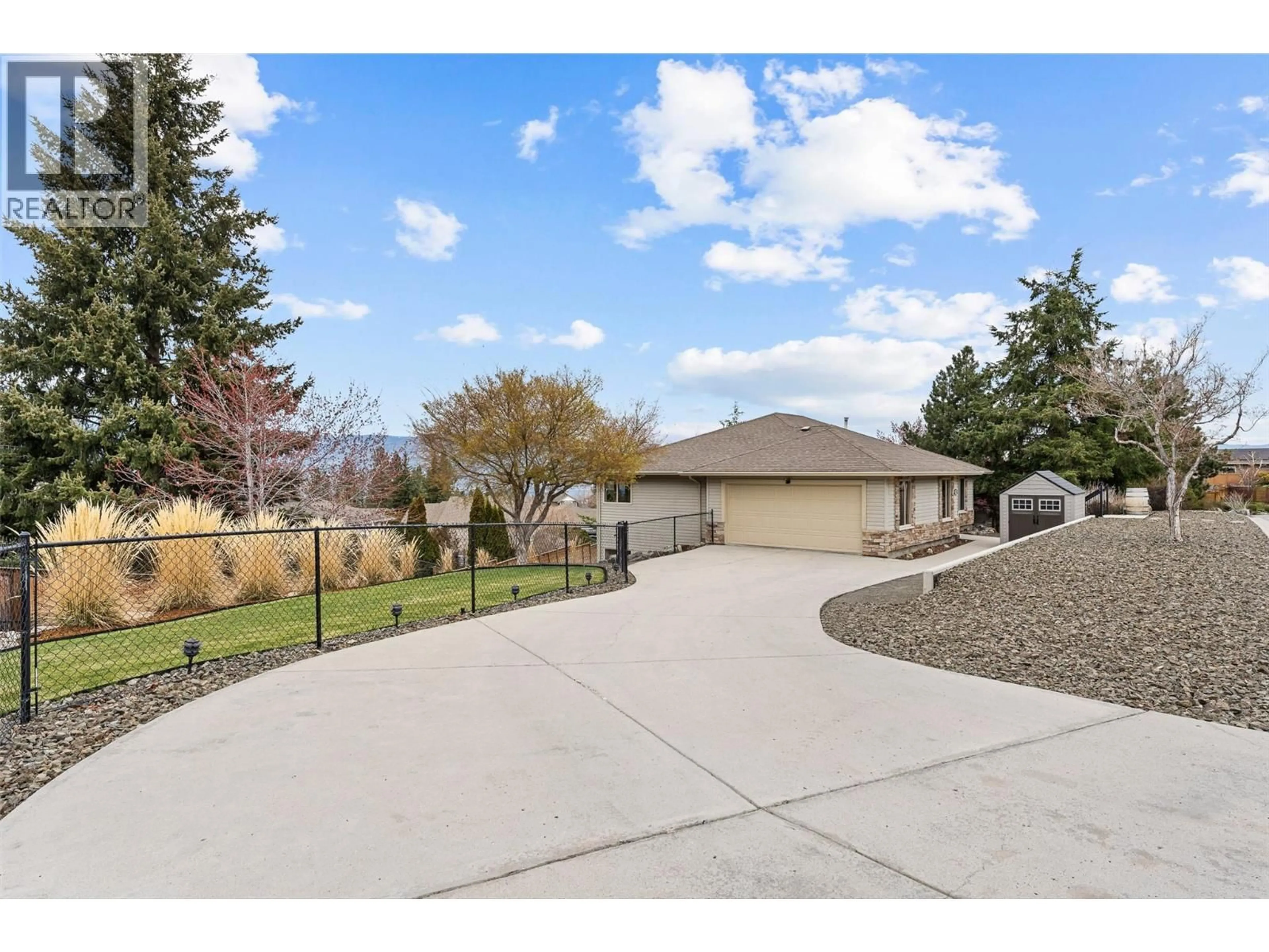 A pic from outside/outdoor area/front of a property/back of a property/a pic from drone, unknown for 5190 COBBLE CRESCENT, Kelowna British Columbia V1W4Y8