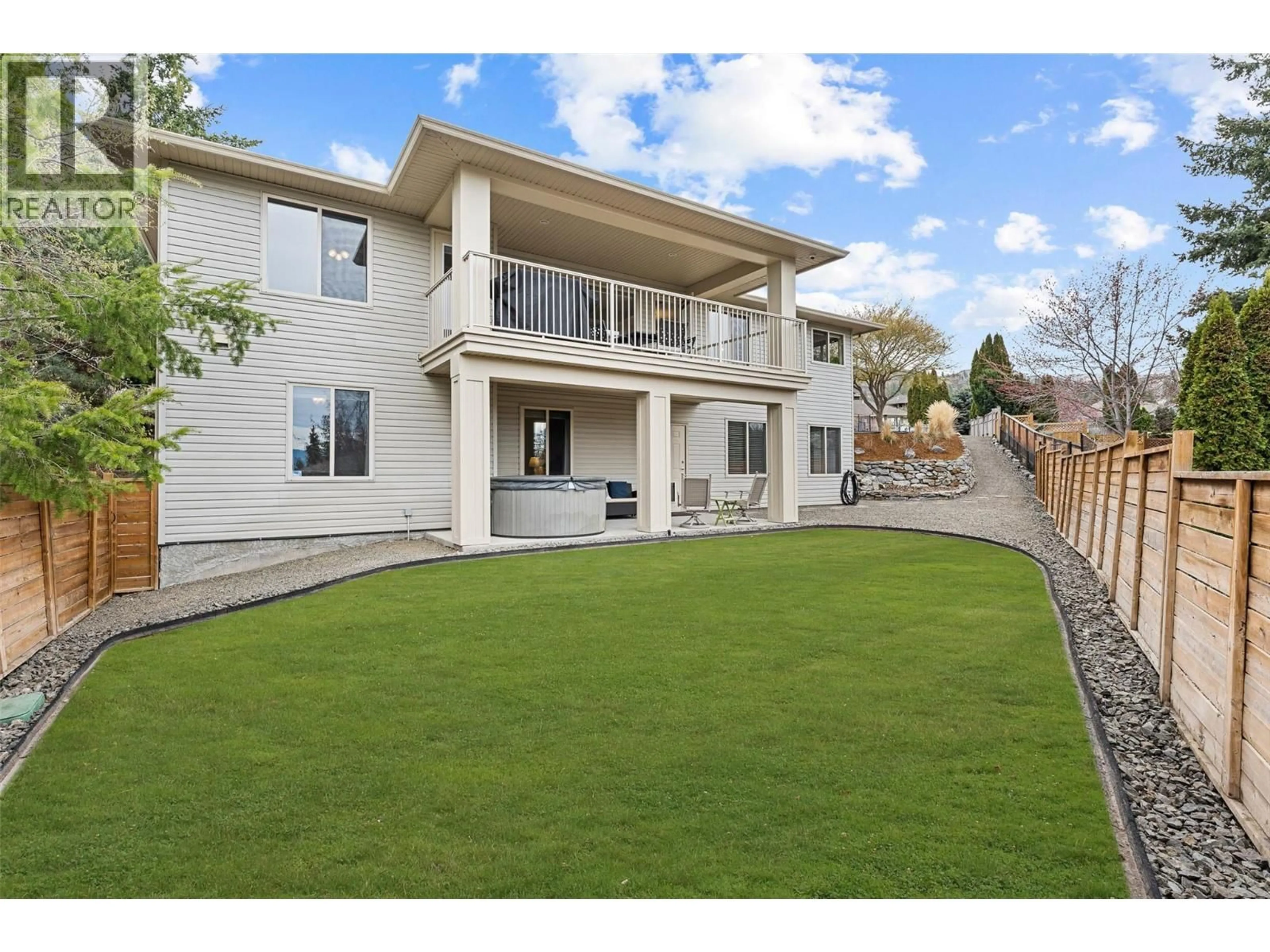 A pic from outside/outdoor area/front of a property/back of a property/a pic from drone, mountain view for 5190 COBBLE CRESCENT, Kelowna British Columbia V1W4Y8