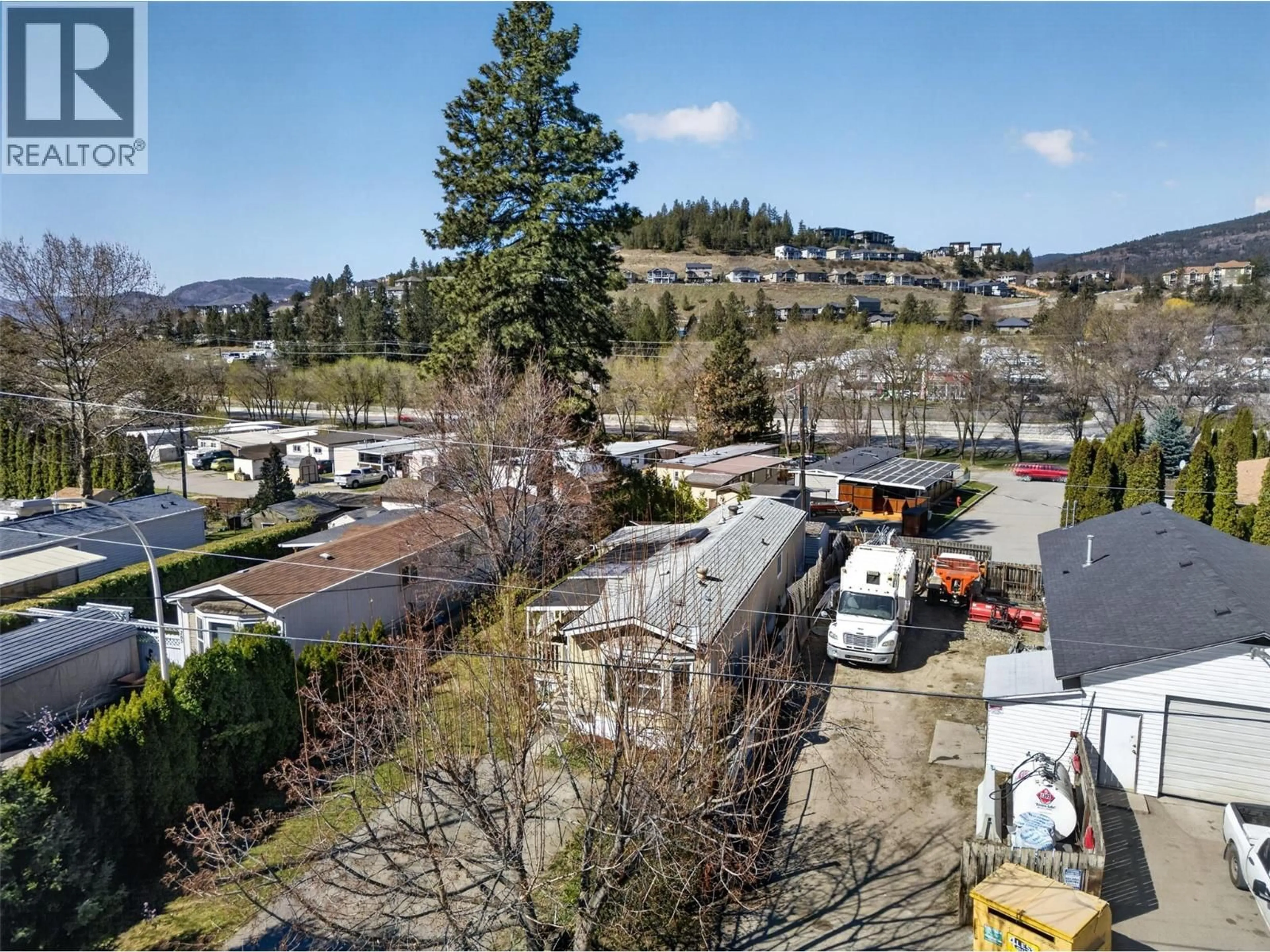 A pic from outside/outdoor area/front of a property/back of a property/a pic from drone, mountain view for 284 - 1999 HIGHWAY 97S OTHER, Kelowna British Columbia V1Z1B2