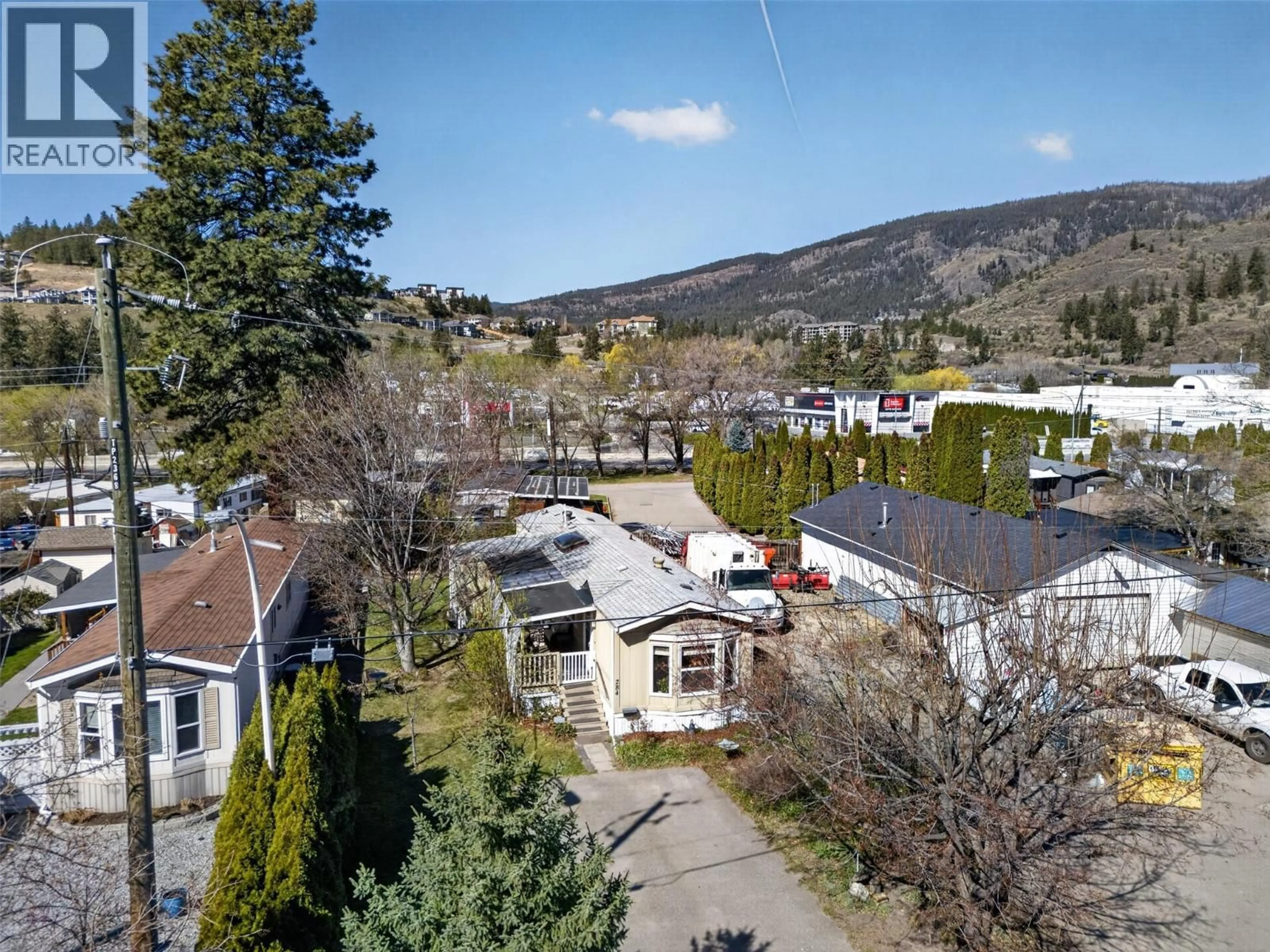 A pic from outside/outdoor area/front of a property/back of a property/a pic from drone, mountain view for 284 - 1999 HIGHWAY 97S OTHER, Kelowna British Columbia V1Z1B2