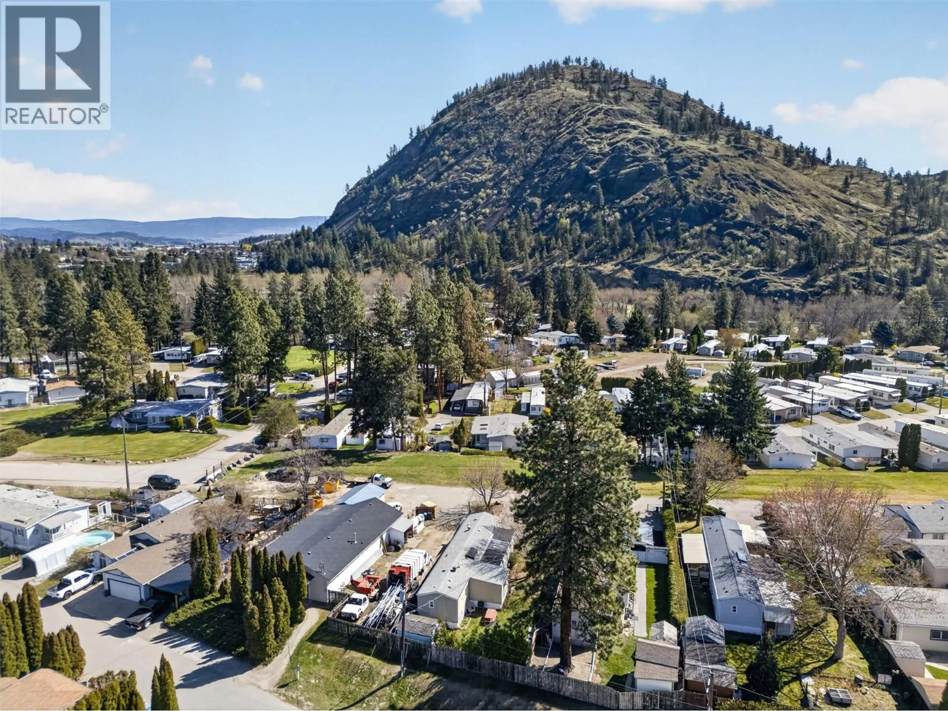 A pic from outside/outdoor area/front of a property/back of a property/a pic from drone, mountain view for 284 - 1999 HIGHWAY 97S OTHER, Kelowna British Columbia V1Z1B2