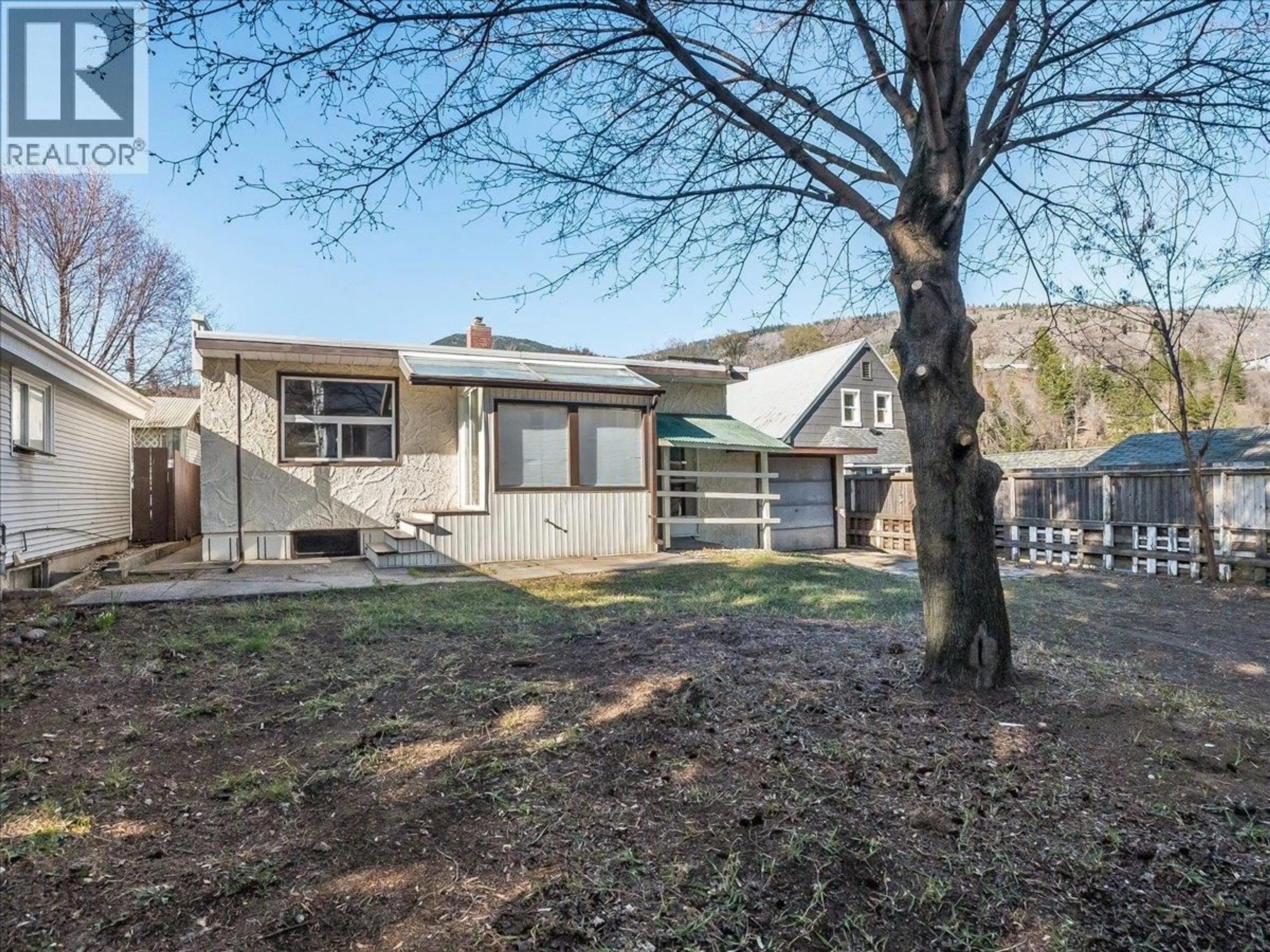 A pic from outside/outdoor area/front of a property/back of a property/a pic from drone, street for 2172 SECOND AVENUE, Trail British Columbia V1N1N5