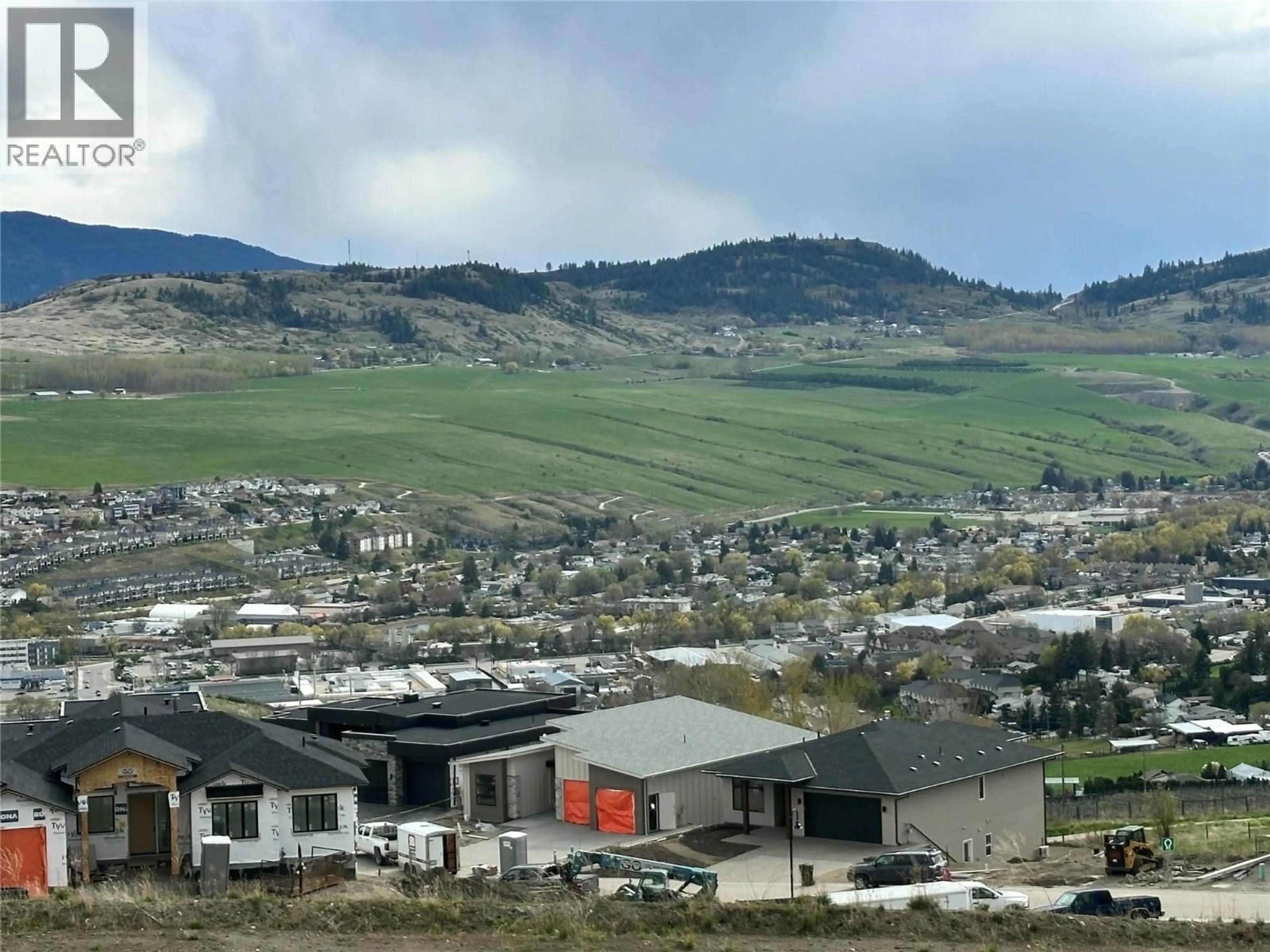 A pic from outside/outdoor area/front of a property/back of a property/a pic from drone, mountain view for 4305 PAINTED TURTLE DRIVE, Vernon British Columbia V1T9W4